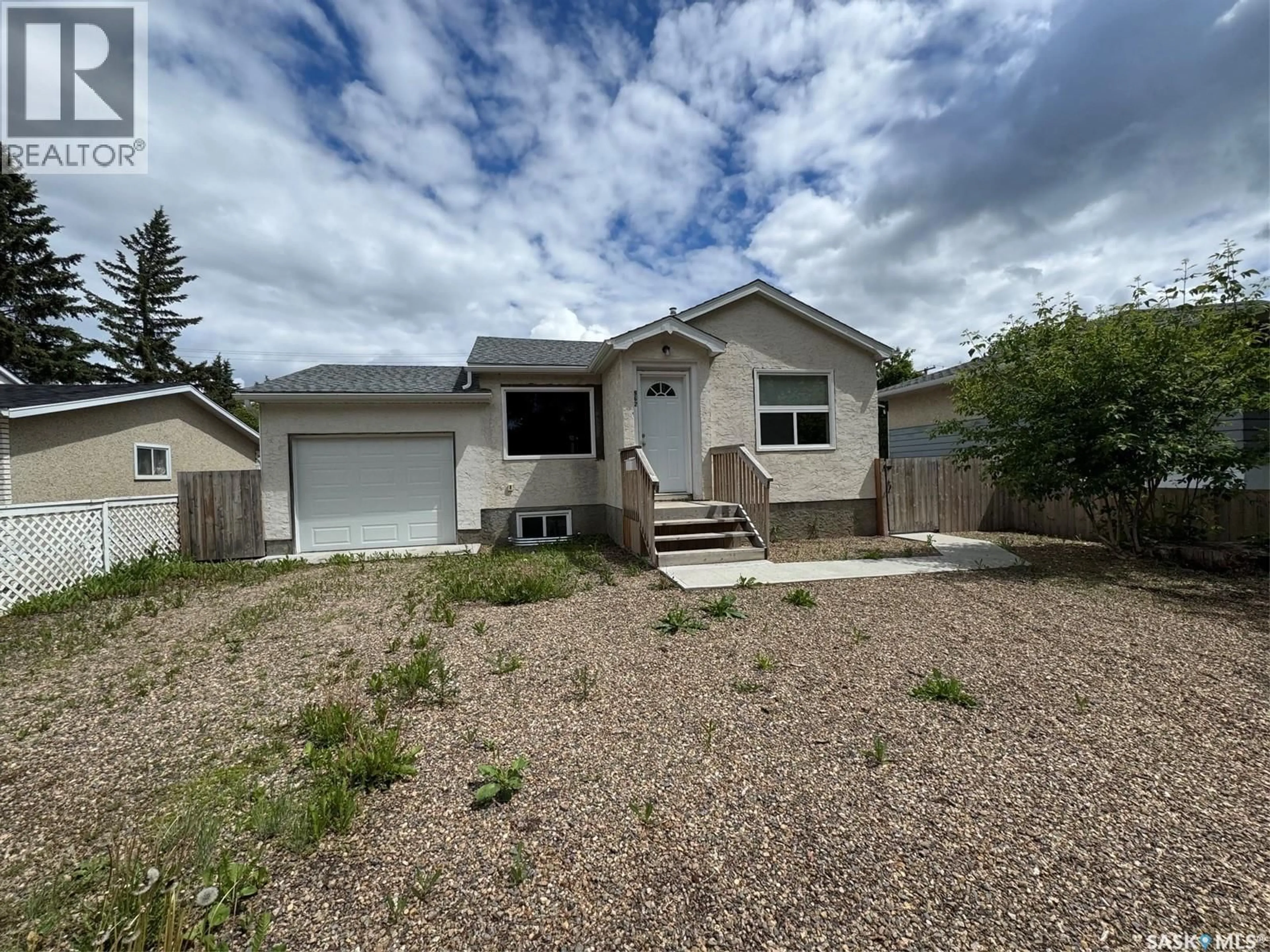 Home with vinyl exterior material, street for 962 109TH STREET, North Battleford Saskatchewan S9A2E2