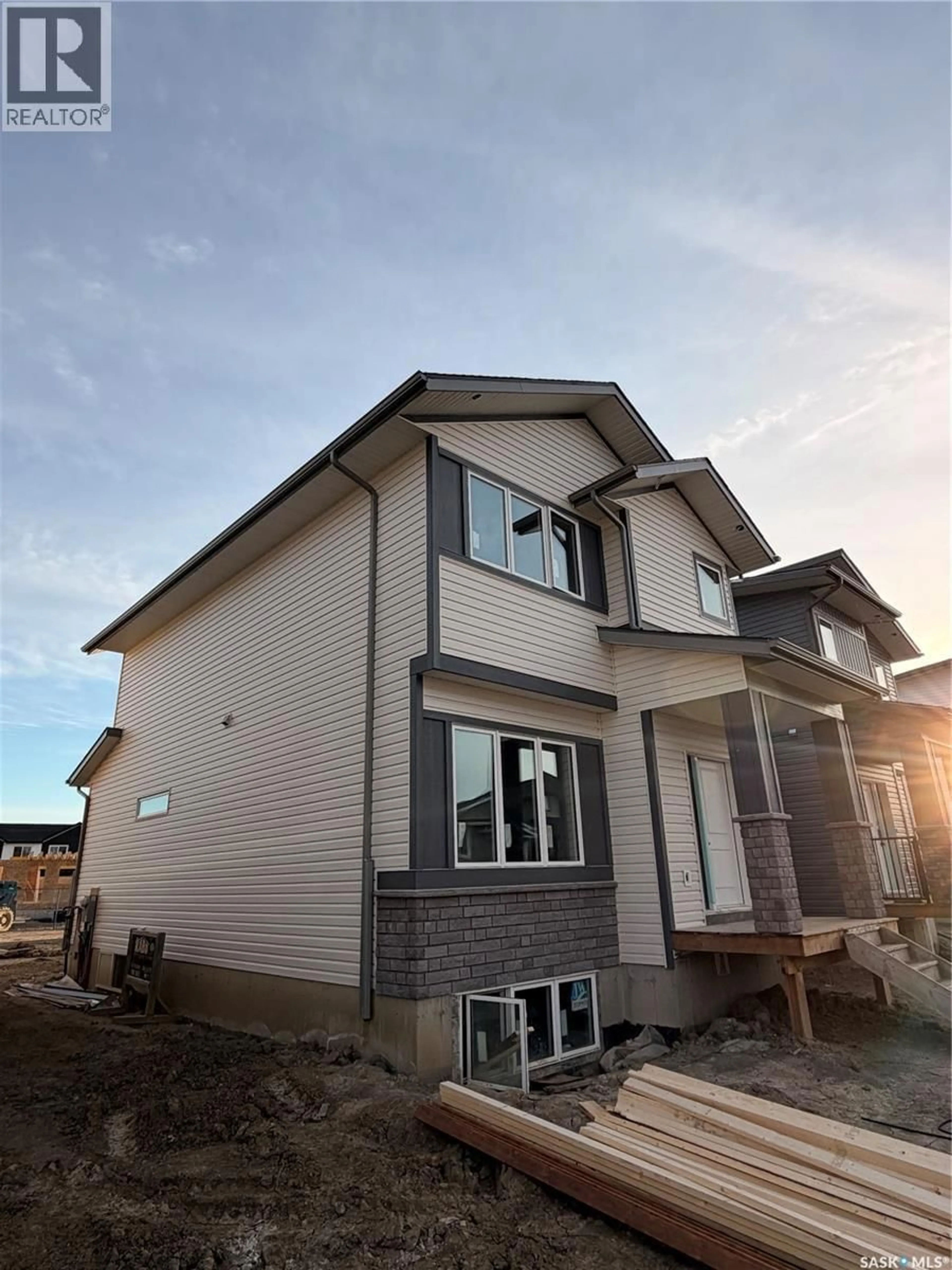 Home with brick exterior material, building for 1428 BESNARD DRIVE, Martensville Saskatchewan S0K2T1