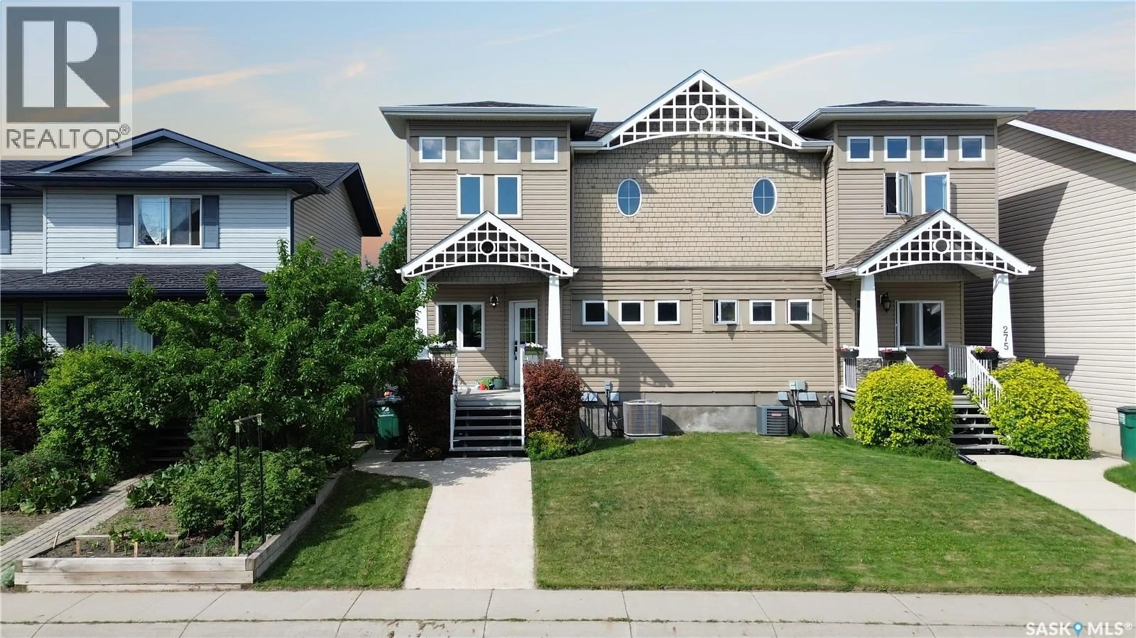 Home with vinyl exterior material, street for 279 RUTHERFORD CRESCENT, Saskatoon Saskatchewan S7N4X5