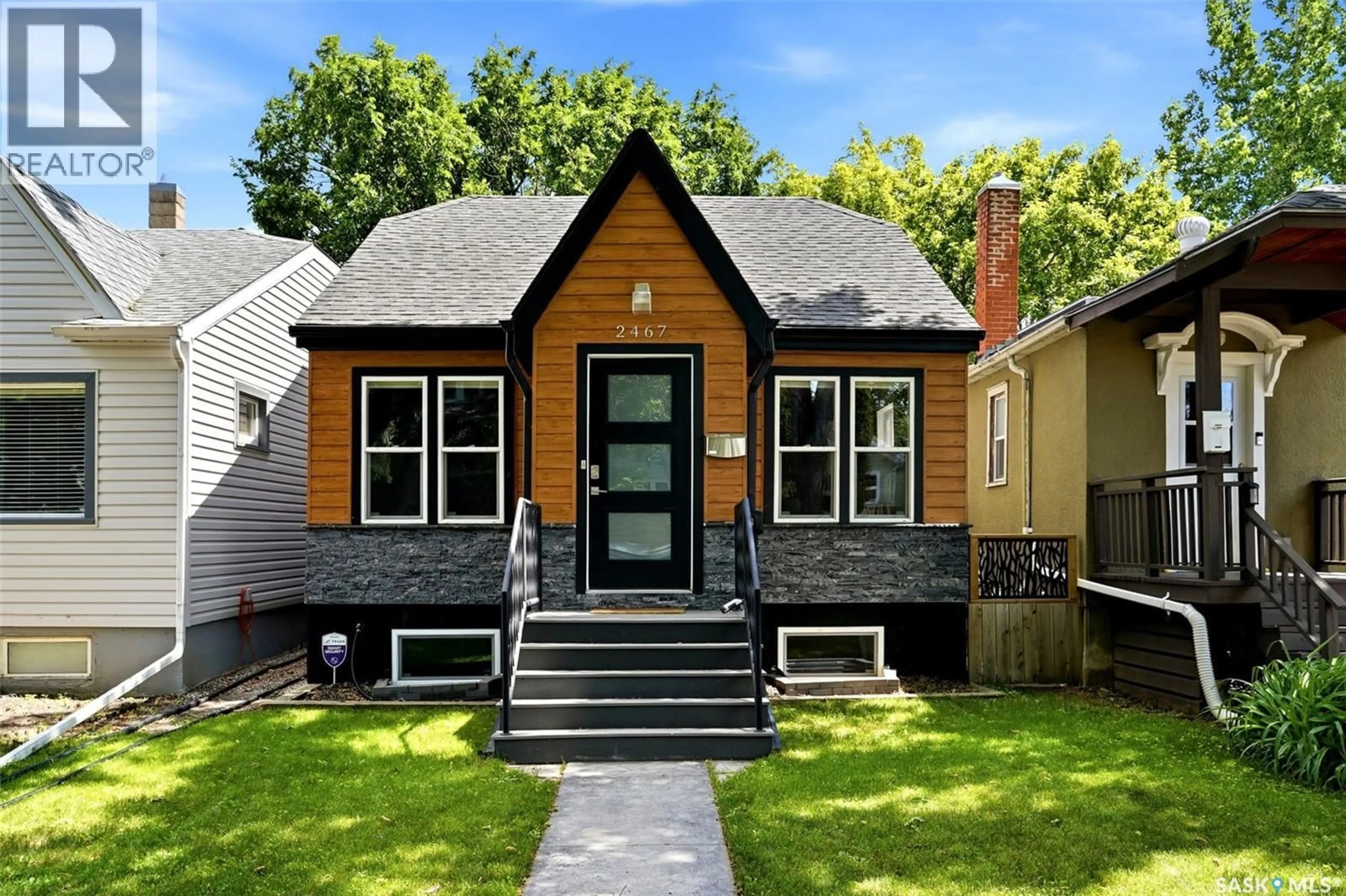 Home with vinyl exterior material, street for 2467 ATKINSON STREET, Regina Saskatchewan S4N3X6