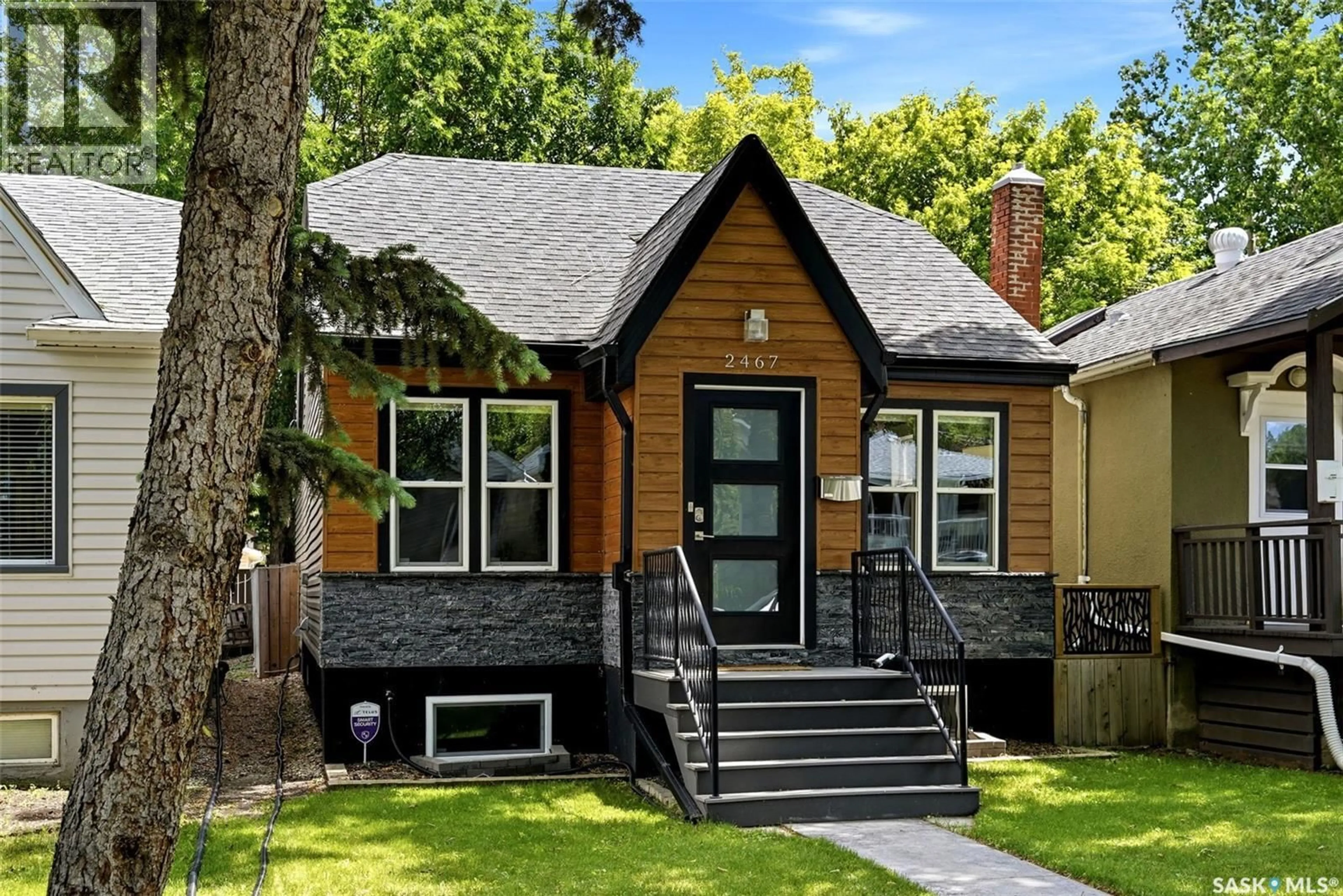 Home with vinyl exterior material, street for 2467 ATKINSON STREET, Regina Saskatchewan S4N3X6