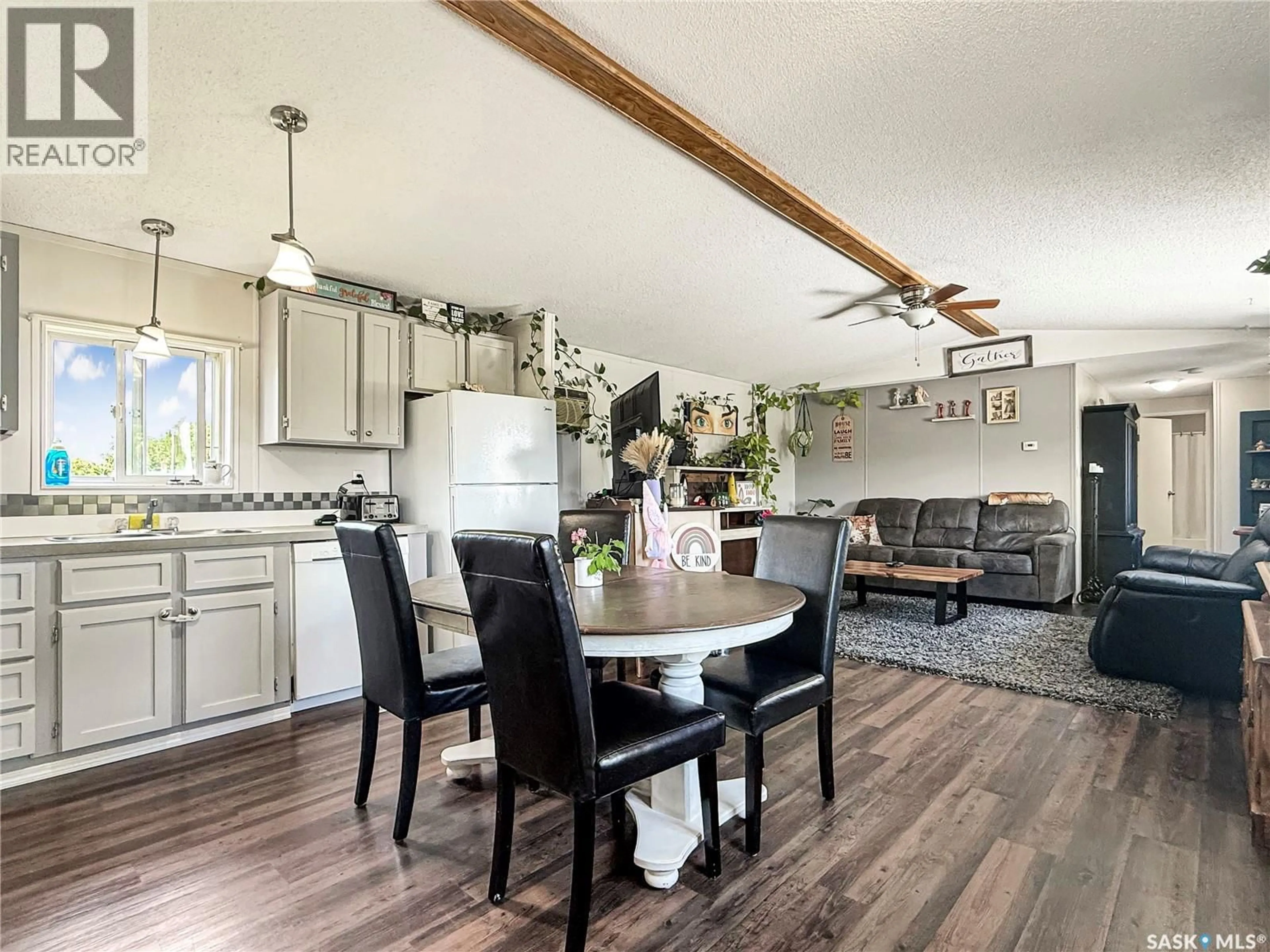 Open concept kitchen, wood/laminate floor for 424 JEROME STREET, Webb Saskatchewan S0N2X0