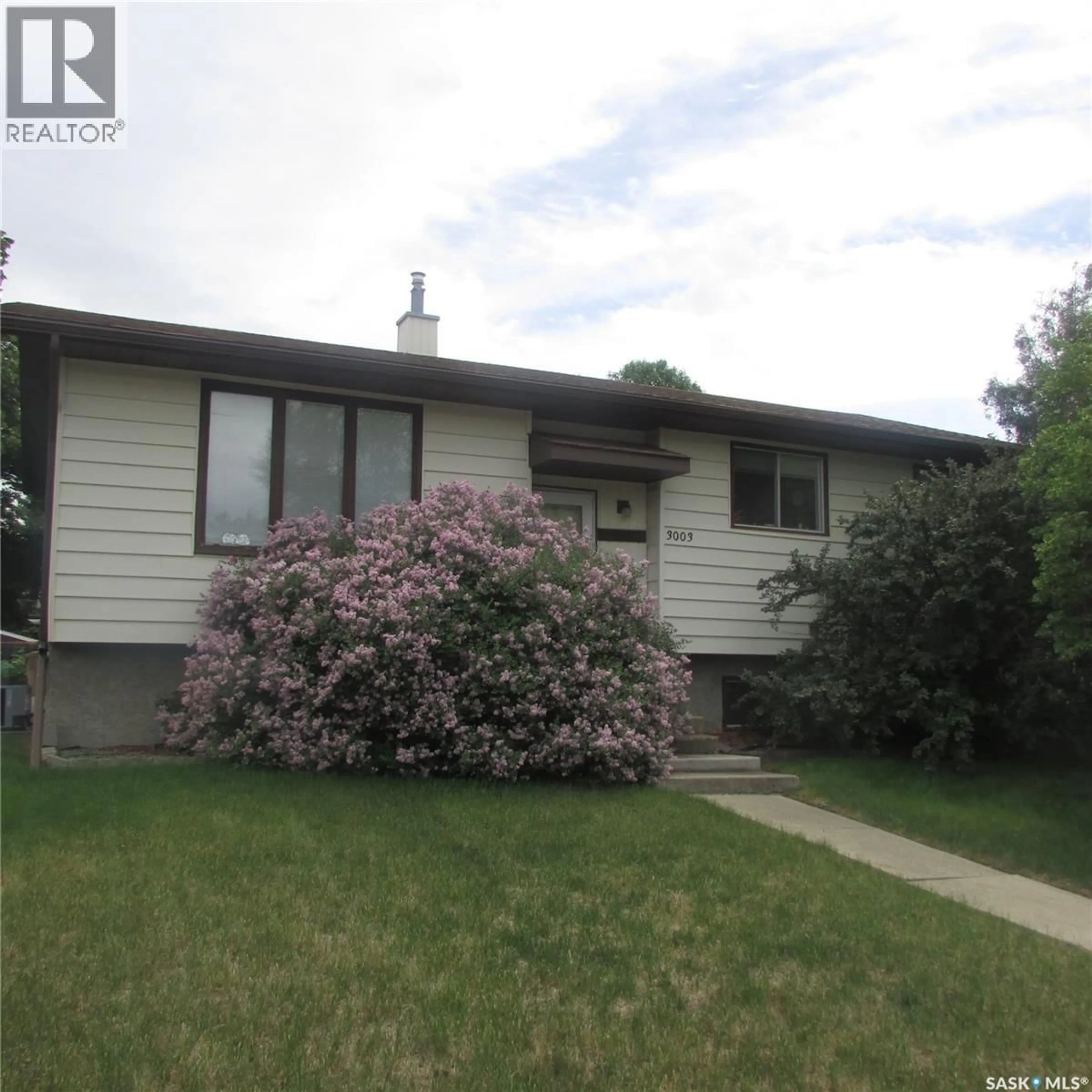 Home with vinyl exterior material, street for 3003 DOAN DRIVE, Regina Saskatchewan S4V1H6
