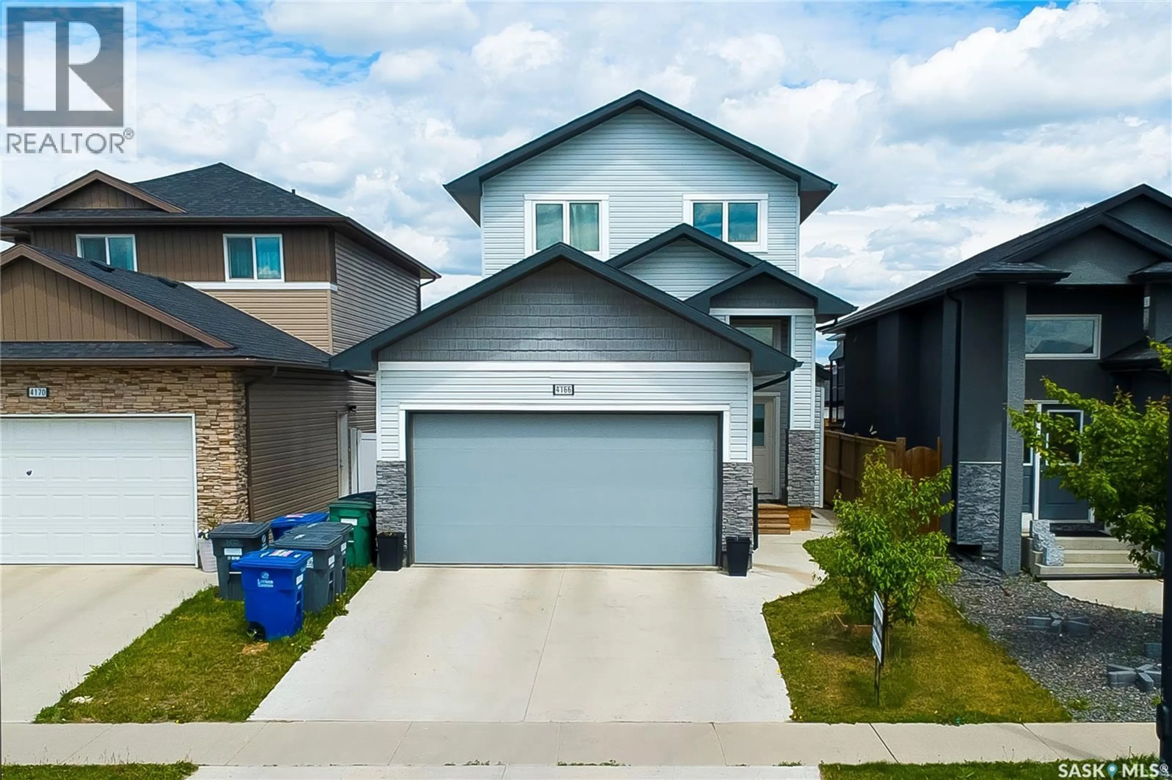 A pic from outside/outdoor area/front of a property/back of a property/a pic from drone, street for 4166 DIEFENBAKER DRIVE, Saskatoon Saskatchewan S7I6W8