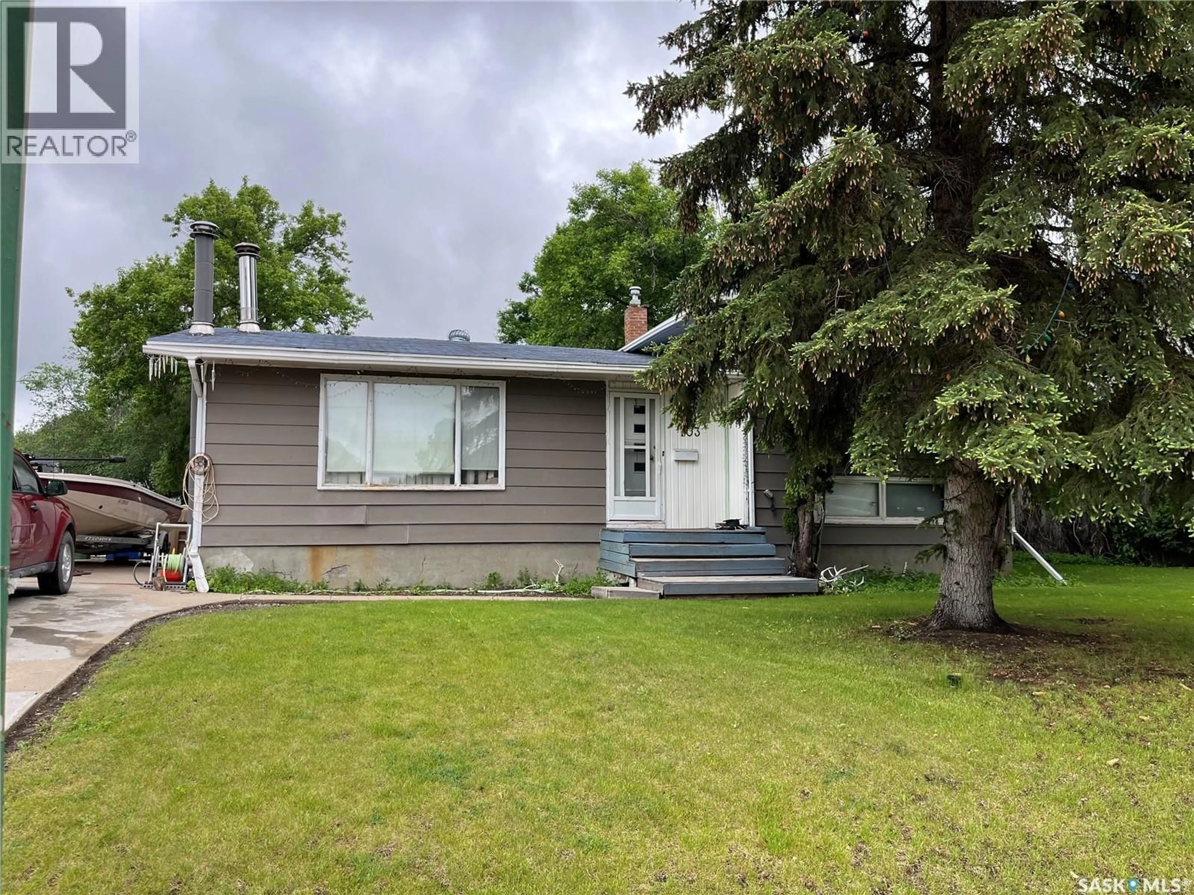 Home with vinyl exterior material, street for 103 MATHESON CRESCENT, Regina Saskatchewan S4R5C3