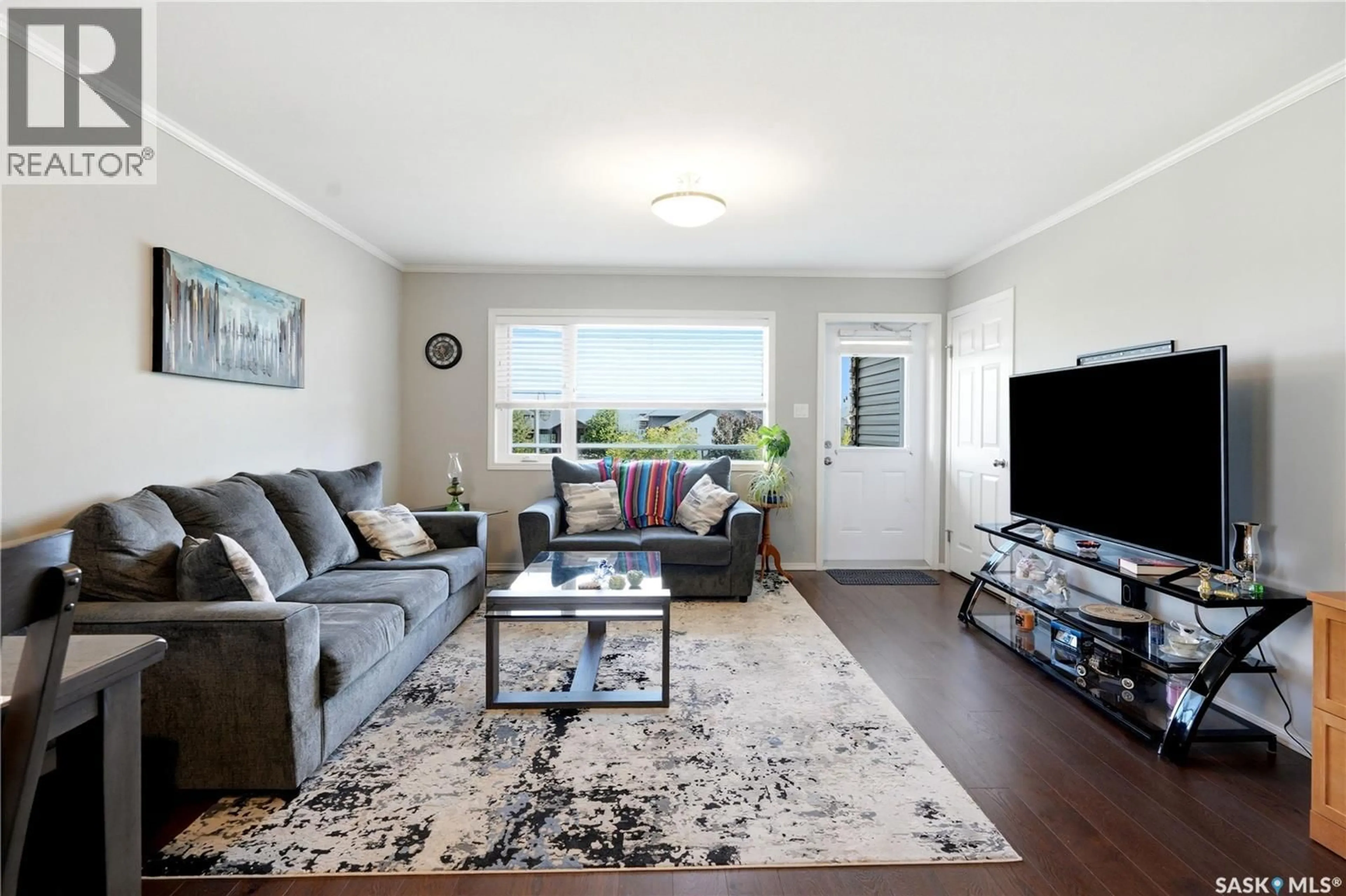Living room with furniture, unknown for 202 275 PRINGLE LANE, Saskatoon Saskatchewan S7T0T5