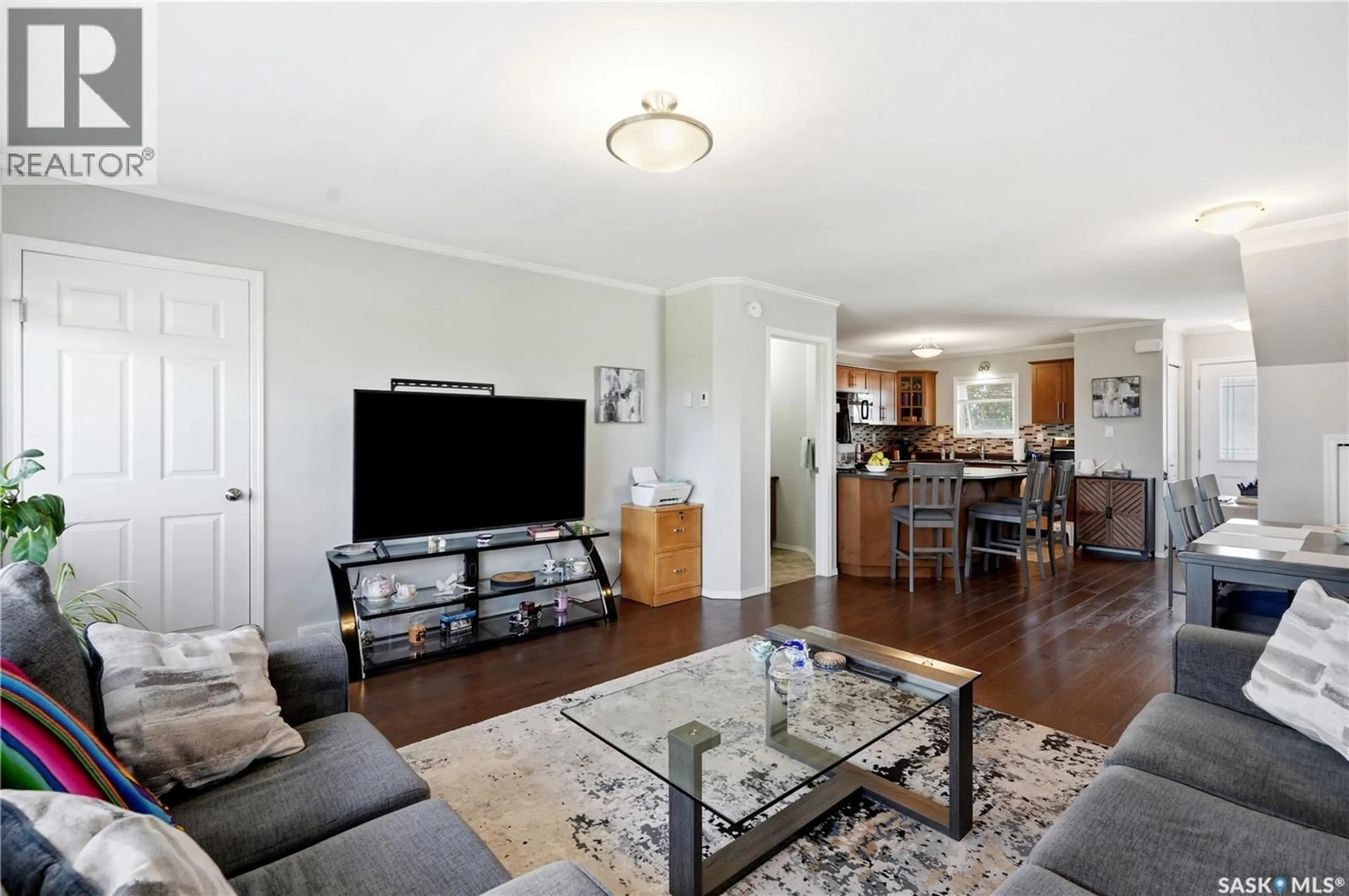 Living room with furniture, unknown for 202 275 PRINGLE LANE, Saskatoon Saskatchewan S7T0T5
