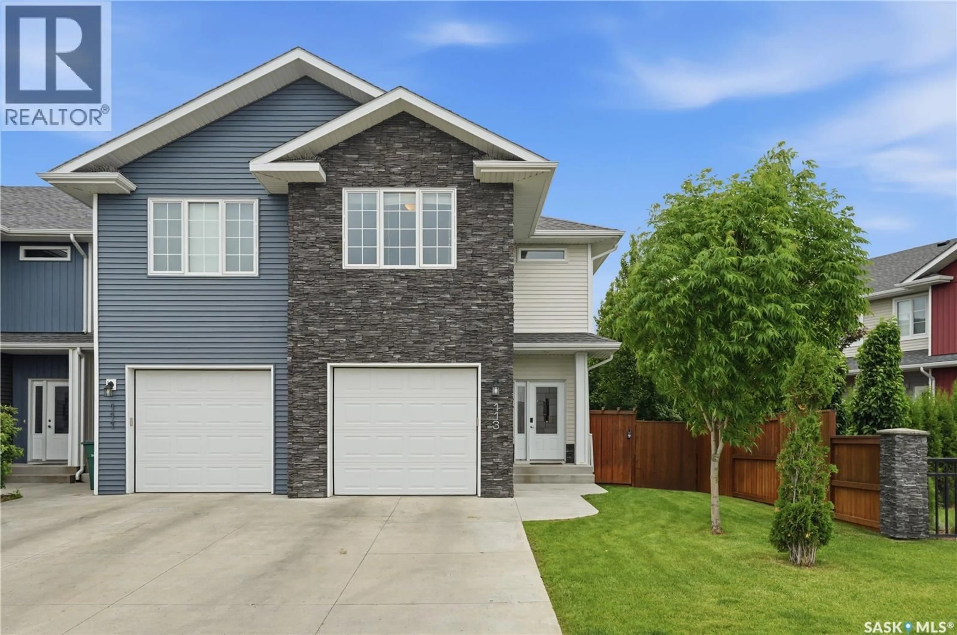 Home with brick exterior material, street for 113 SALLOUM CRESCENT, Saskatoon Saskatchewan S7W0V1