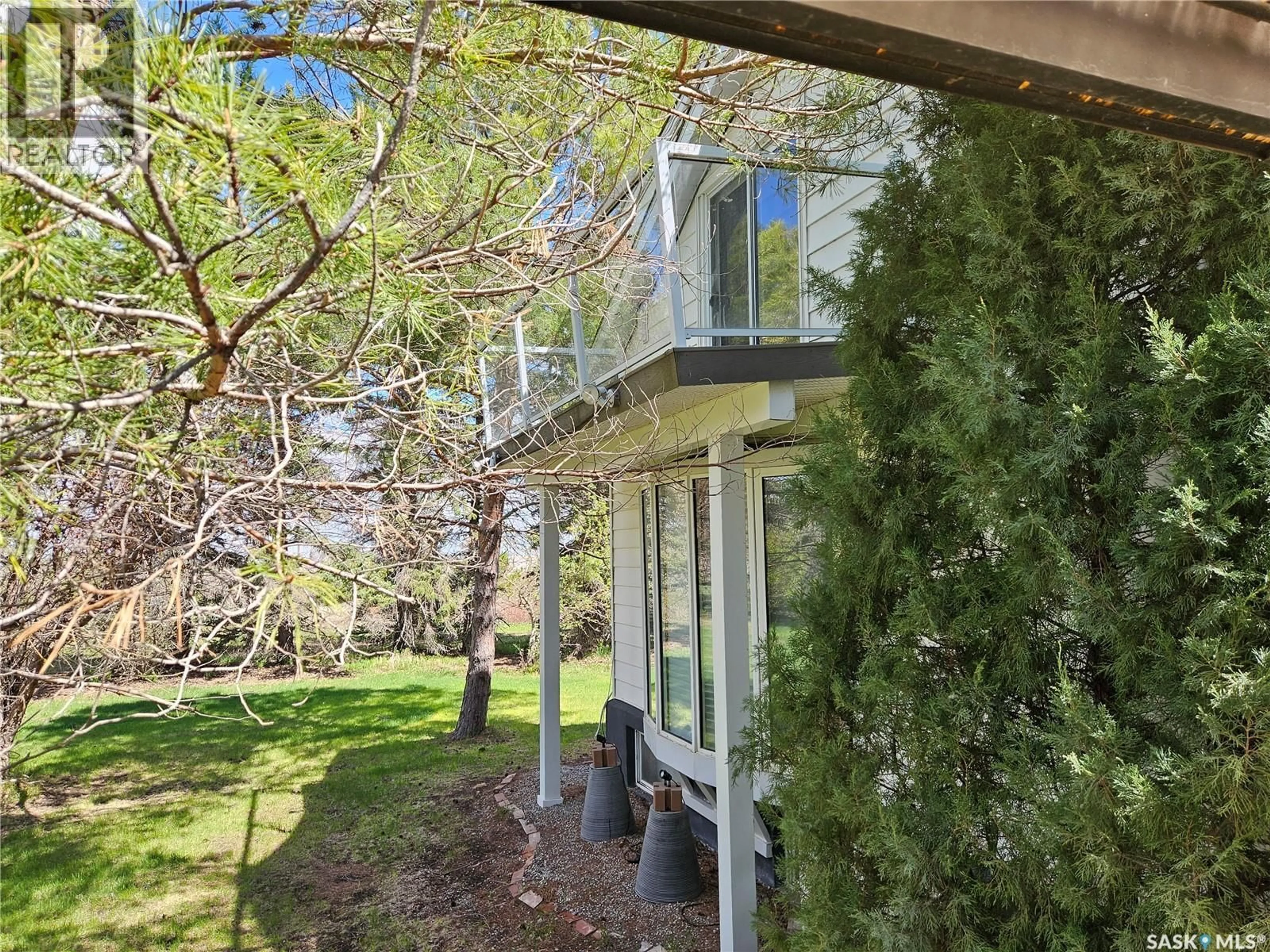 A pic from outside/outdoor area/front of a property/back of a property/a pic from drone, forest/trees view for 128 LAJORD, Lajord Rm No. 128 Saskatchewan S4P2Z3