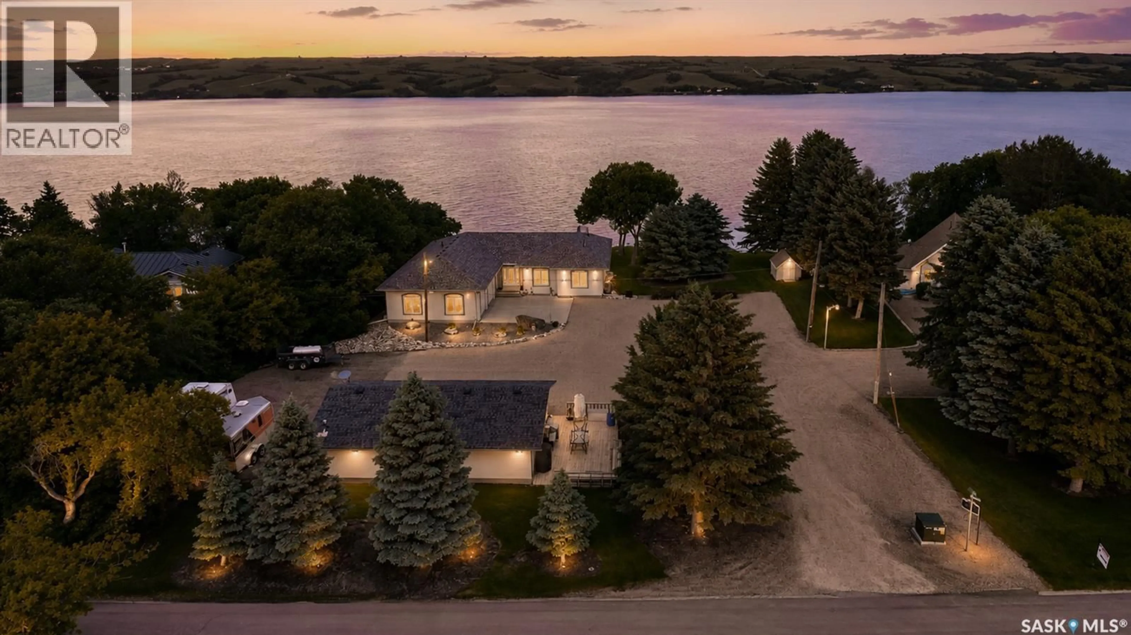 A pic from outside/outdoor area/front of a property/back of a property/a pic from drone, water/lake/river/ocean view for 1232 TATANKA DRIVE, Sun Valley Saskatchewan S0C4H0