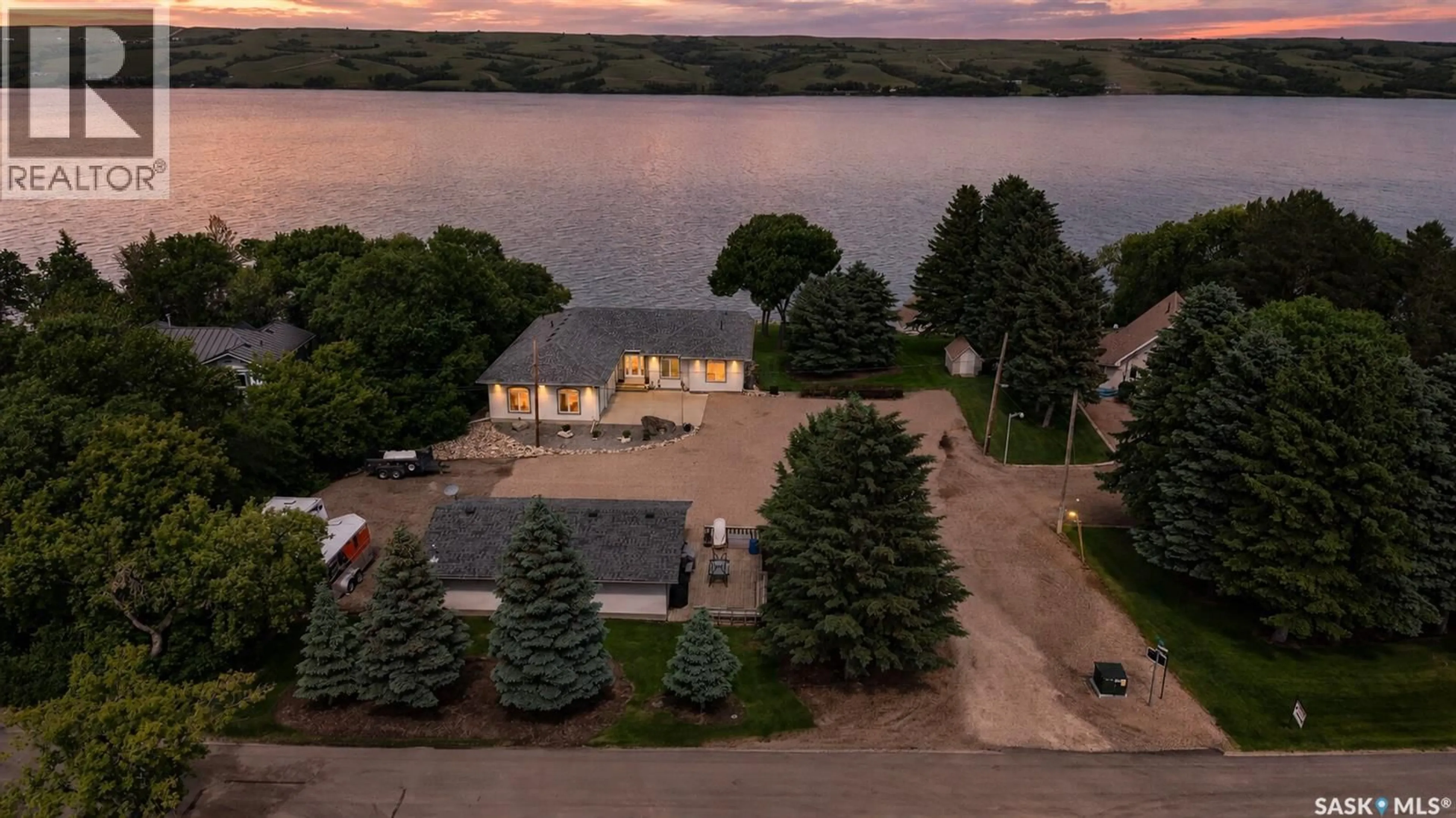 A pic from outside/outdoor area/front of a property/back of a property/a pic from drone, water/lake/river/ocean view for 1232 TATANKA DRIVE, Sun Valley Saskatchewan S0C4H0