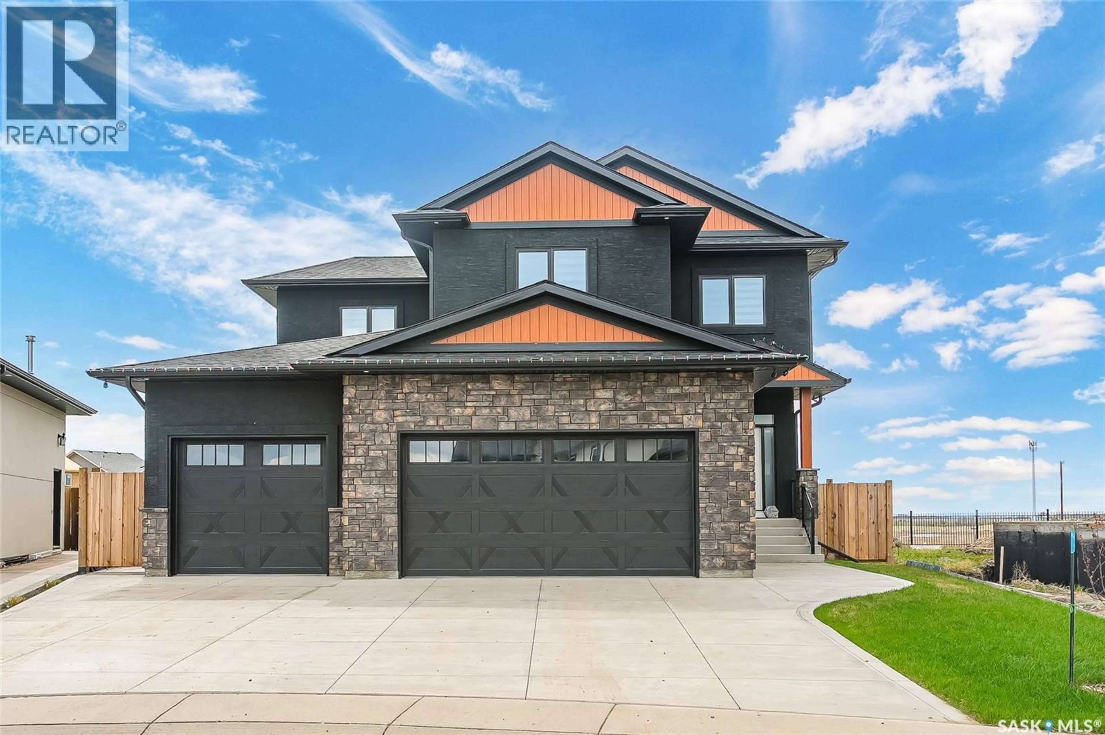 Home with brick exterior material, street for 862 BENTLEY MANOR, Saskatoon Saskatchewan S7L6P4