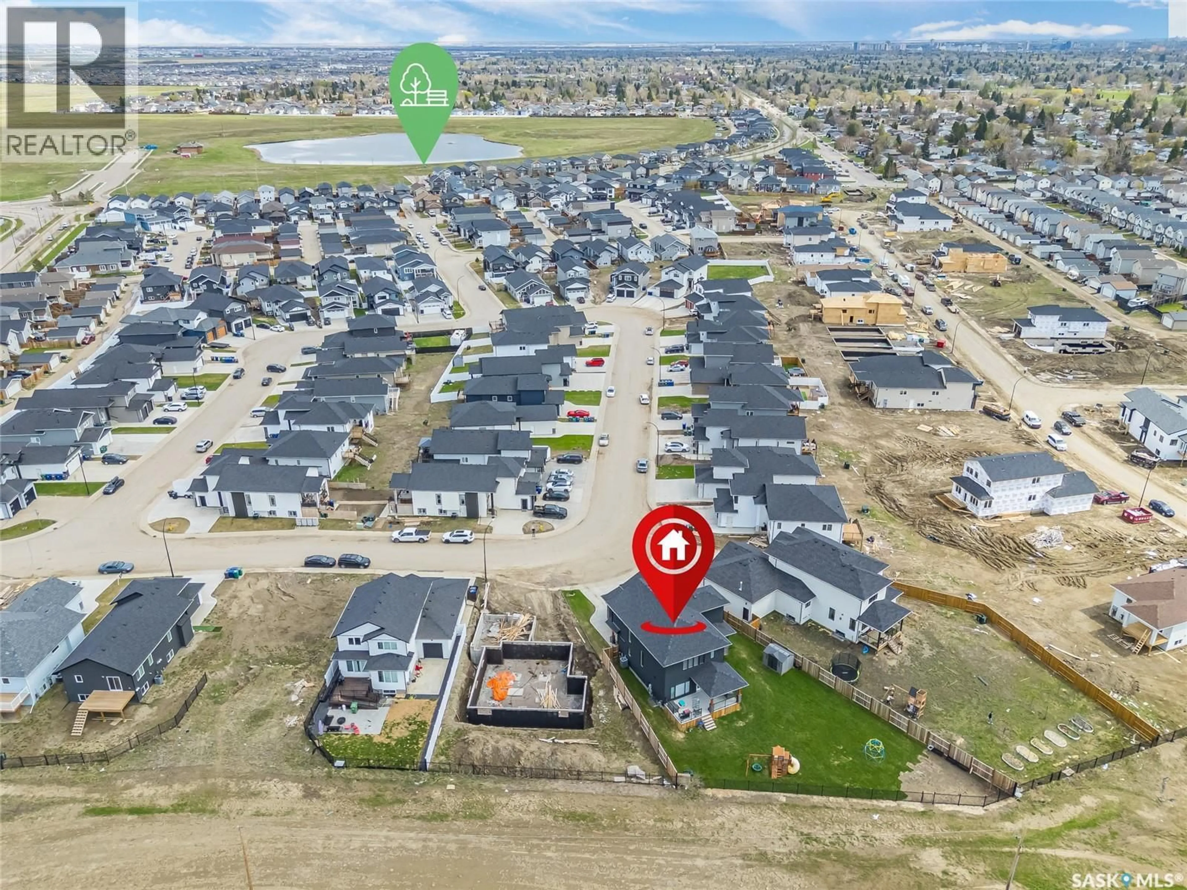 A pic from outside/outdoor area/front of a property/back of a property/a pic from drone, street for 862 BENTLEY MANOR, Saskatoon Saskatchewan S7L6P4