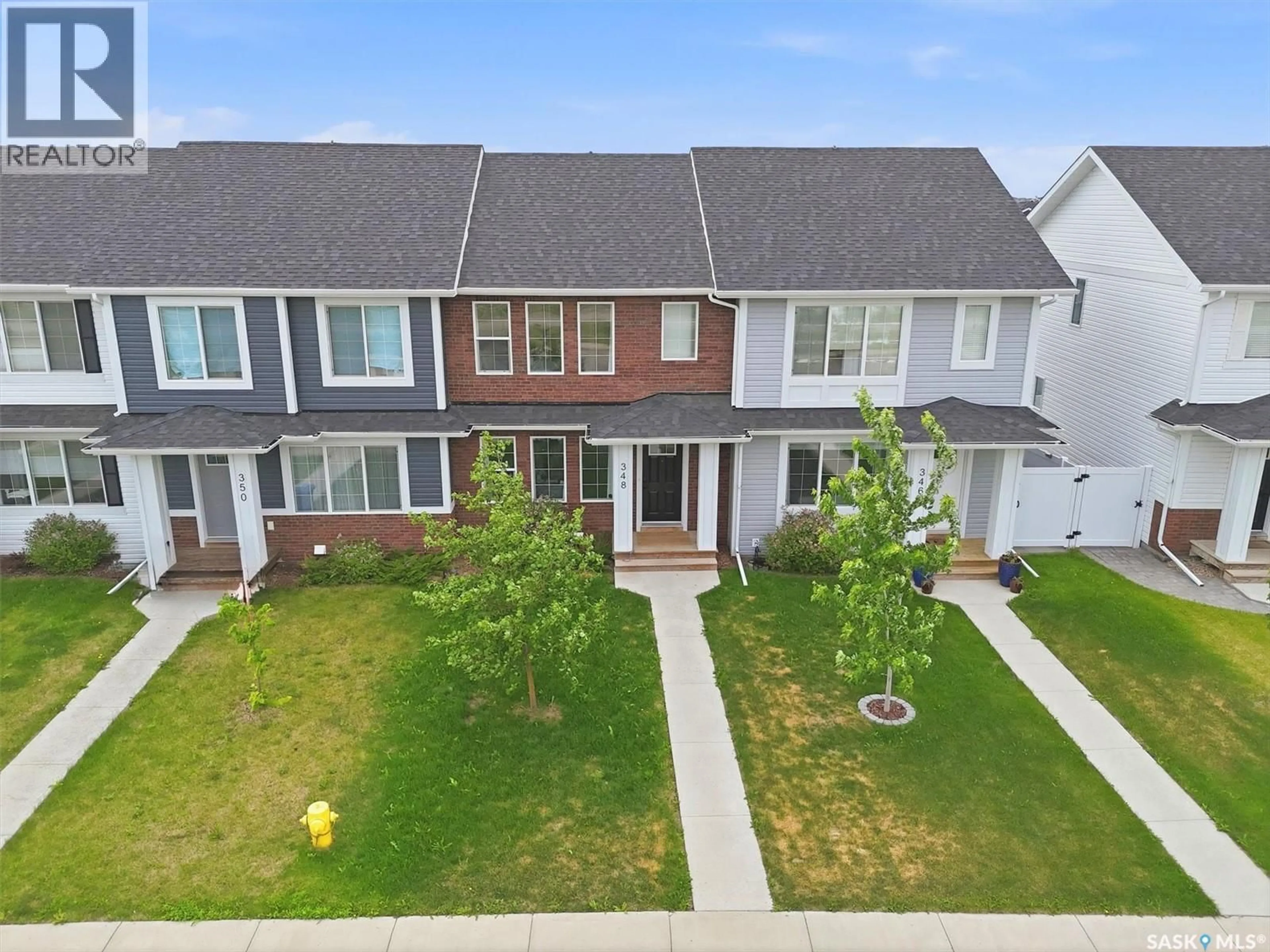 A pic from outside/outdoor area/front of a property/back of a property/a pic from drone, street for 348 MCORMOND DRIVE, Saskatoon Saskatchewan S7V0W9
