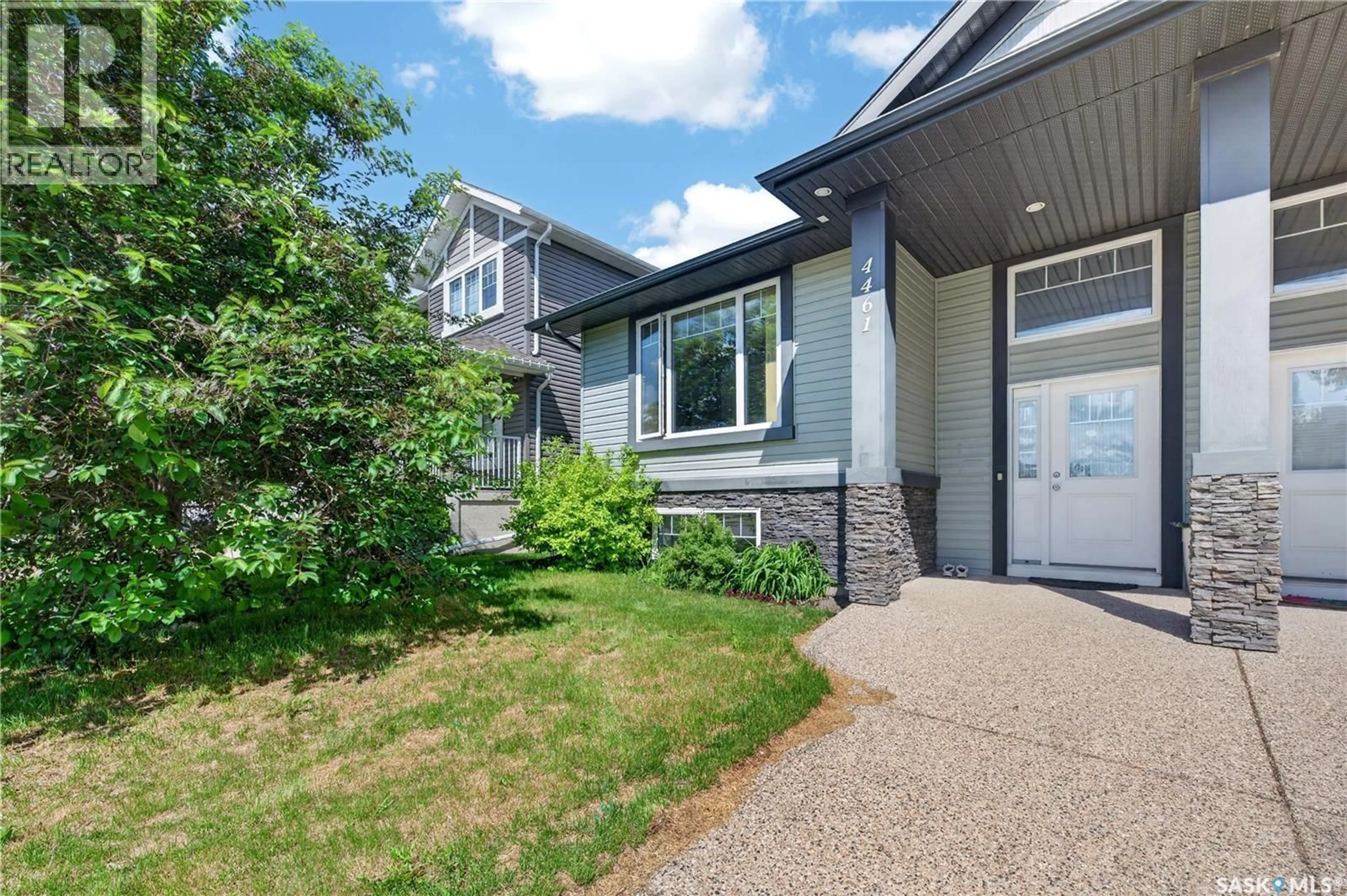 Home with vinyl exterior material, street for 4461 JAMES HILL ROAD, Regina Saskatchewan S4W0K5