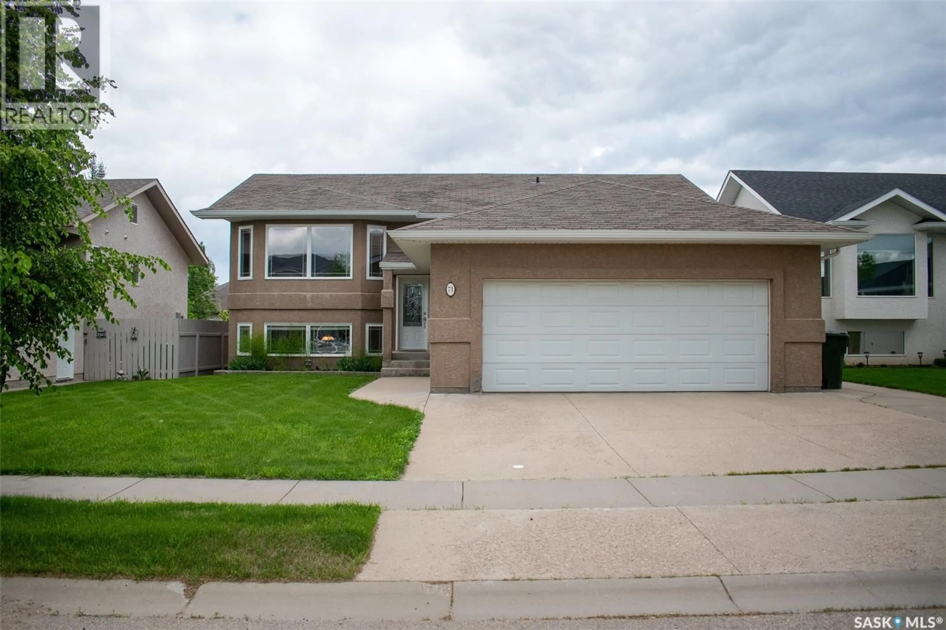 Home with vinyl exterior material, street for 71 LONGPRE CRESCENT, Prince Albert Saskatchewan S6X1C6