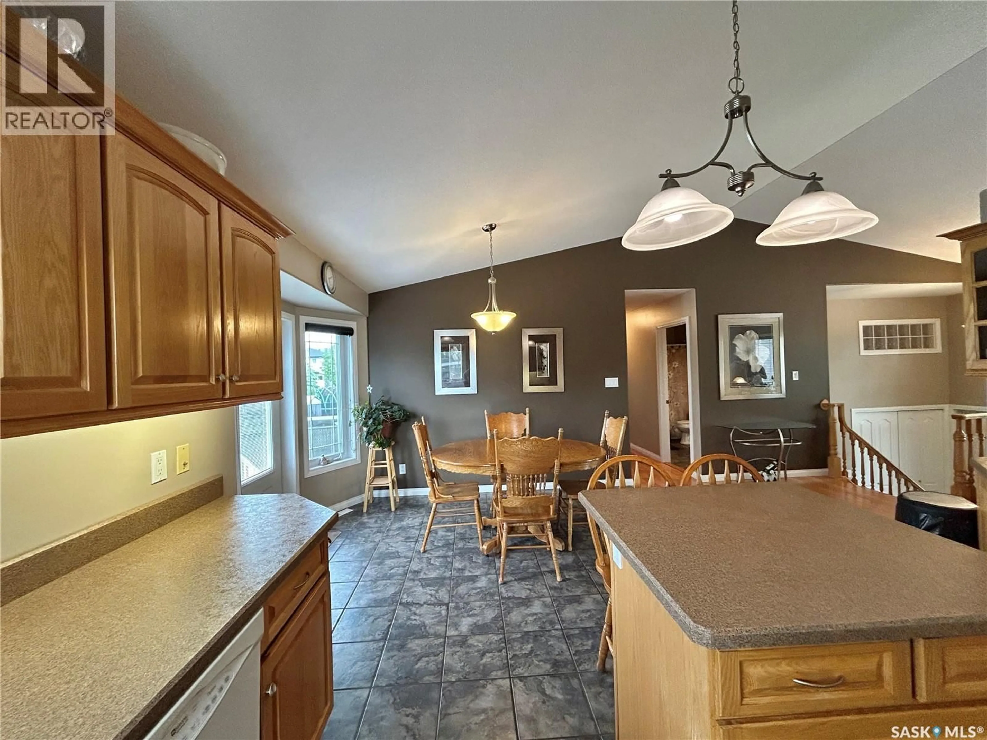 Open concept kitchen, ceramic/tile floor for 71 LONGPRE CRESCENT, Prince Albert Saskatchewan S6X1C6