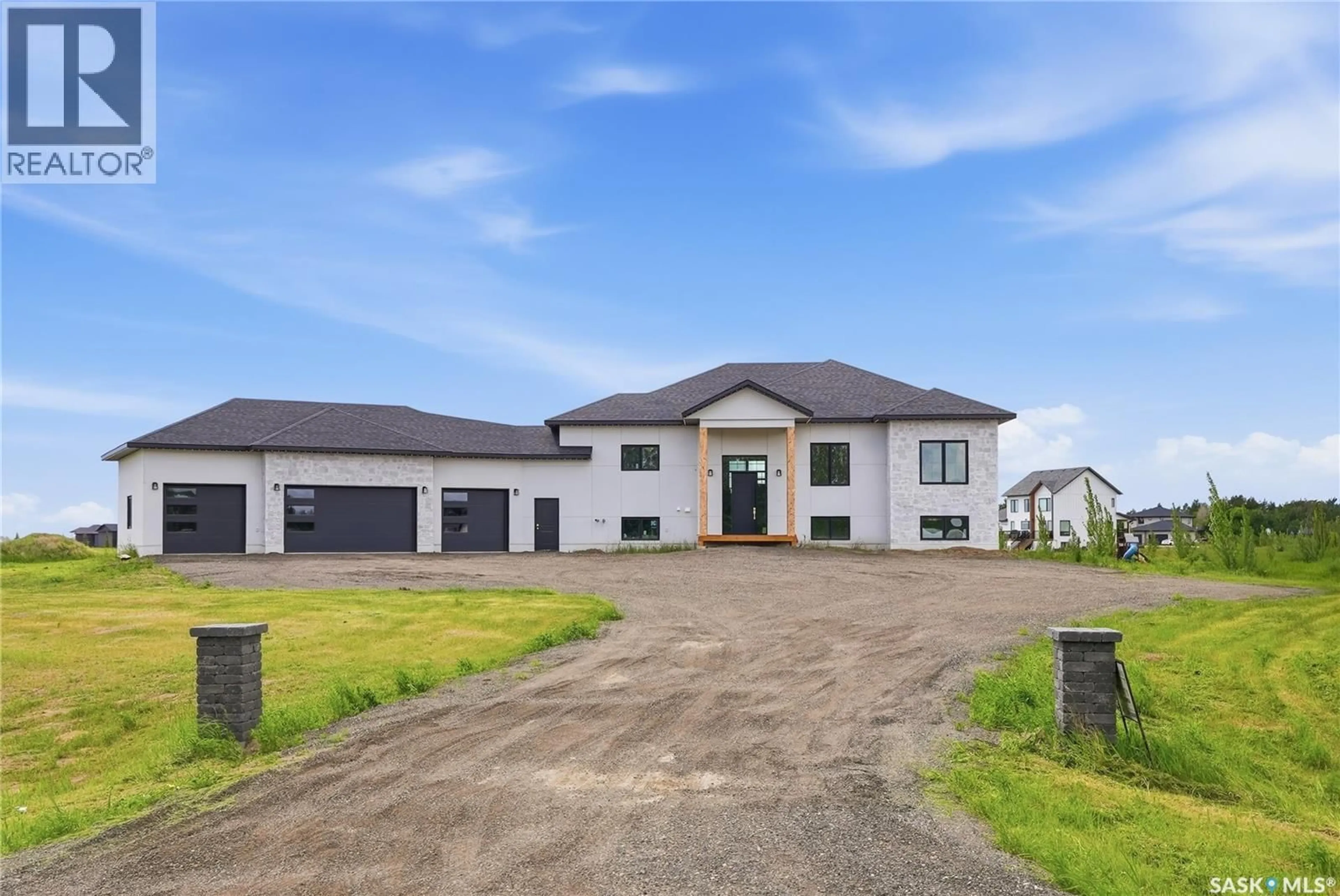 A pic from outside/outdoor area/front of a property/back of a property/a pic from drone, building for 100 GRANDVIEW TRAIL, Corman Park Rm No. 344 Saskatchewan S7T0W5