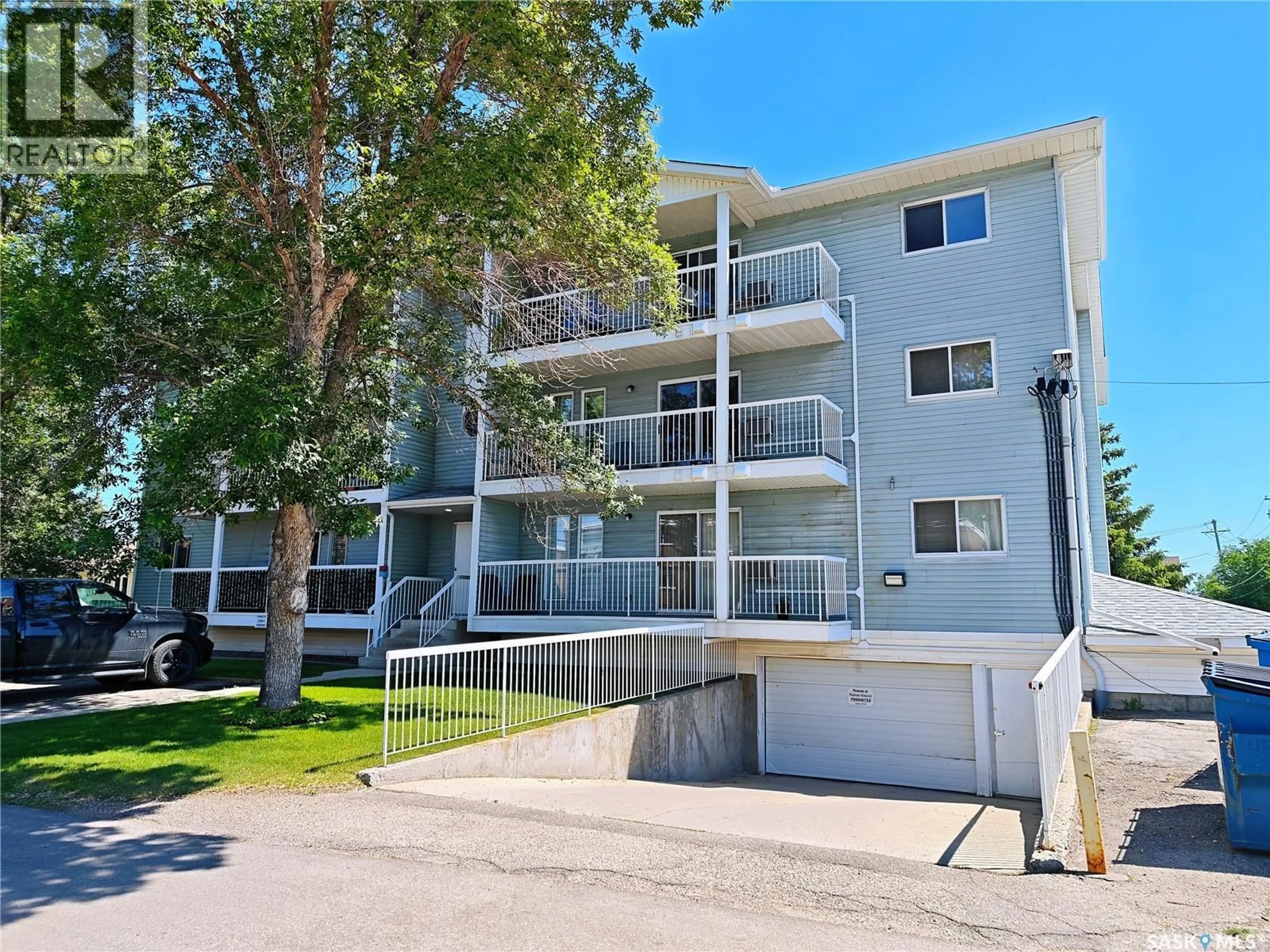 A pic from outside/outdoor area/front of a property/back of a property/a pic from drone, street for 301 918 ARGYLE AVENUE, Saskatoon Saskatchewan S7H2W1