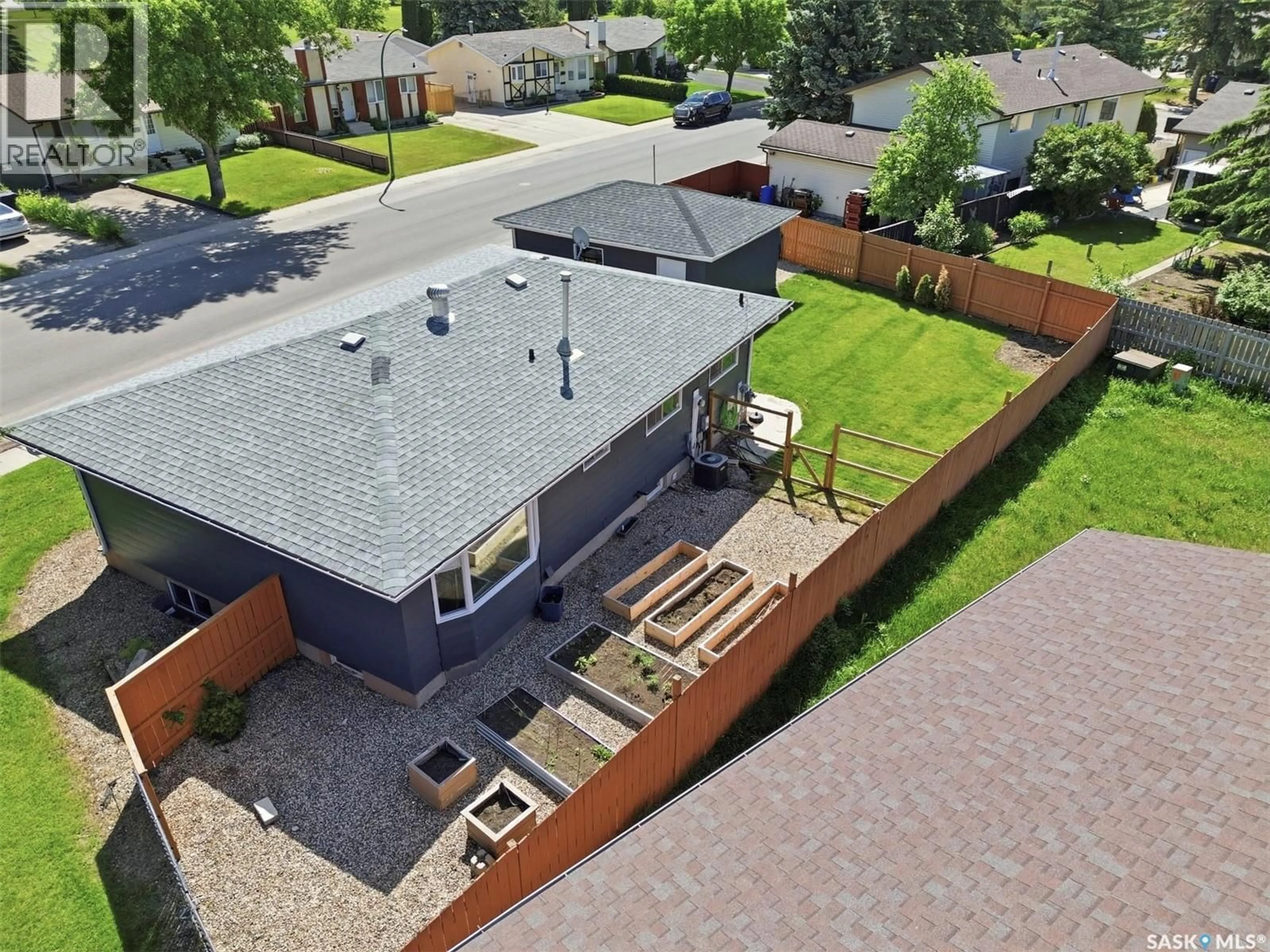 A pic from outside/outdoor area/front of a property/back of a property/a pic from drone, street for 103 APPLEBY DRIVE, Saskatoon Saskatchewan S7M4B4