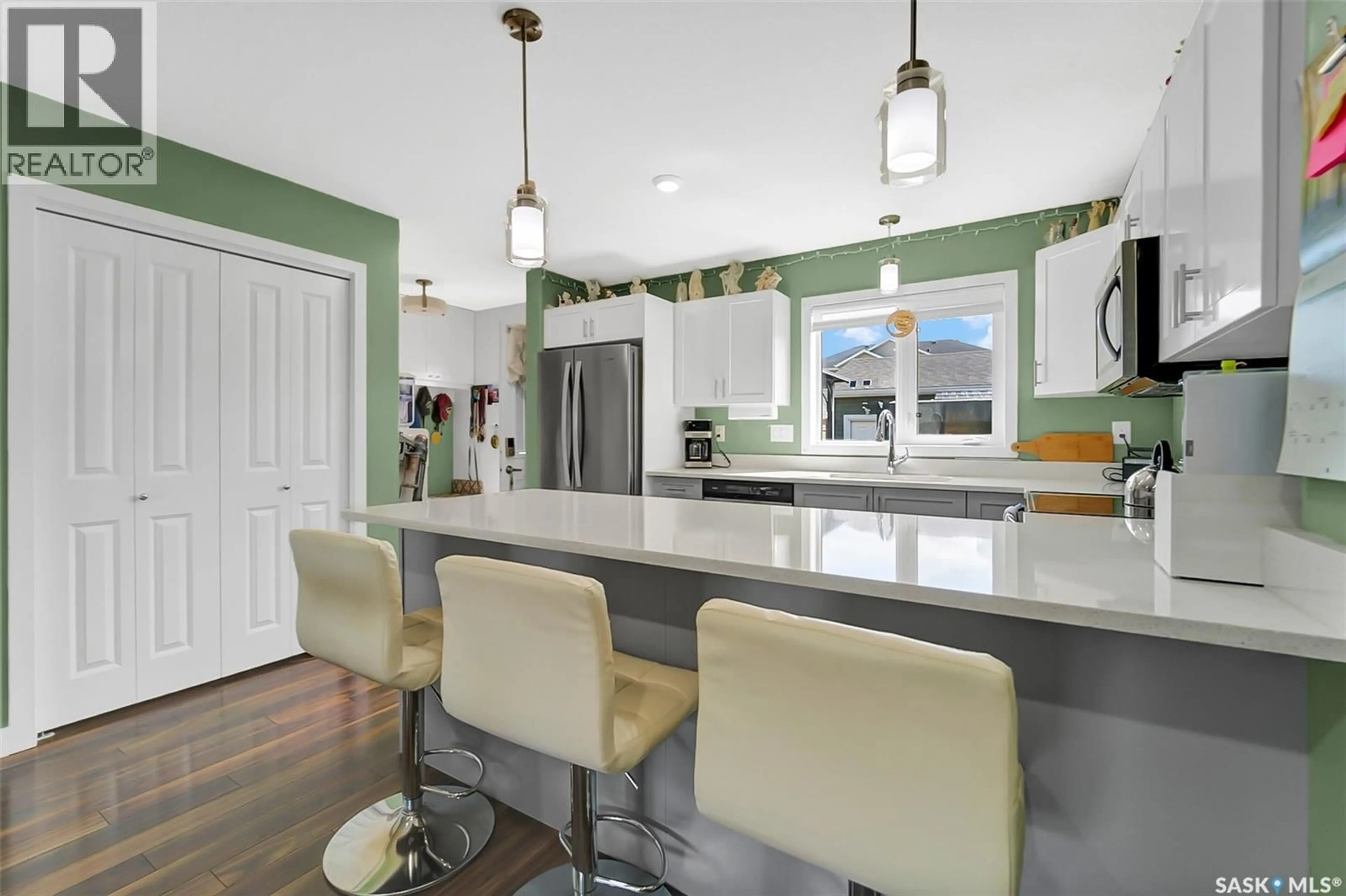 Open concept kitchen, ceramic/tile floor for 133 CODETTE LANE, Martensville Saskatchewan S0K2T1