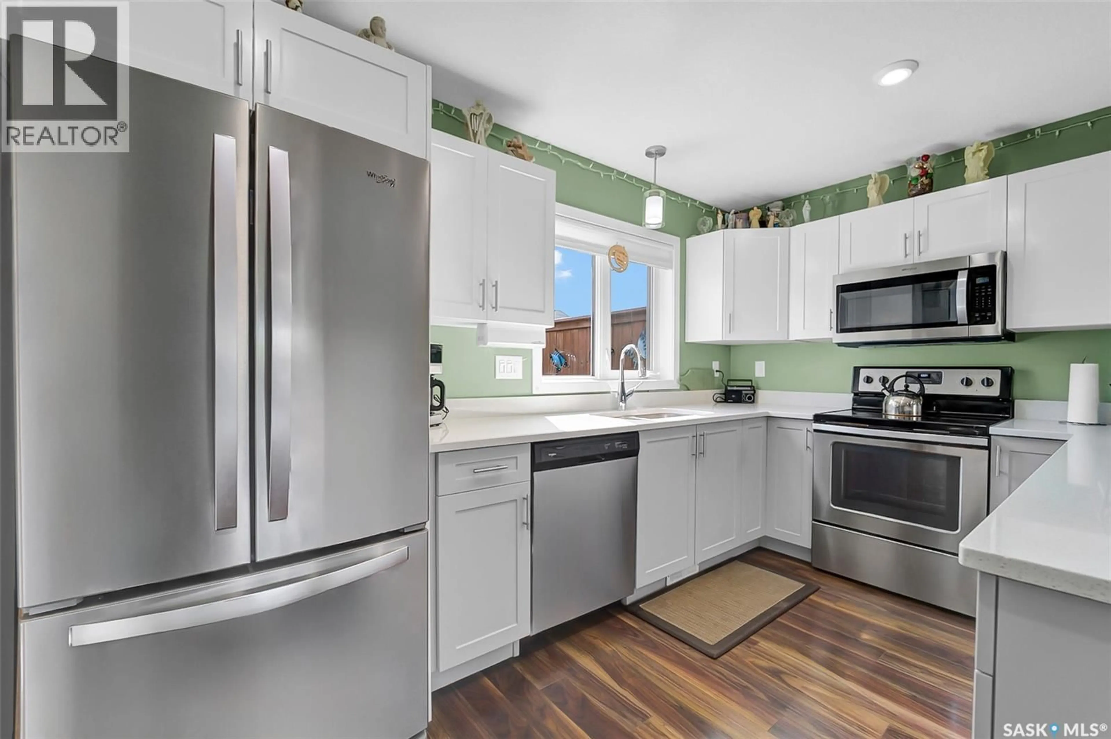 Open concept kitchen, ceramic/tile floor for 133 CODETTE LANE, Martensville Saskatchewan S0K2T1