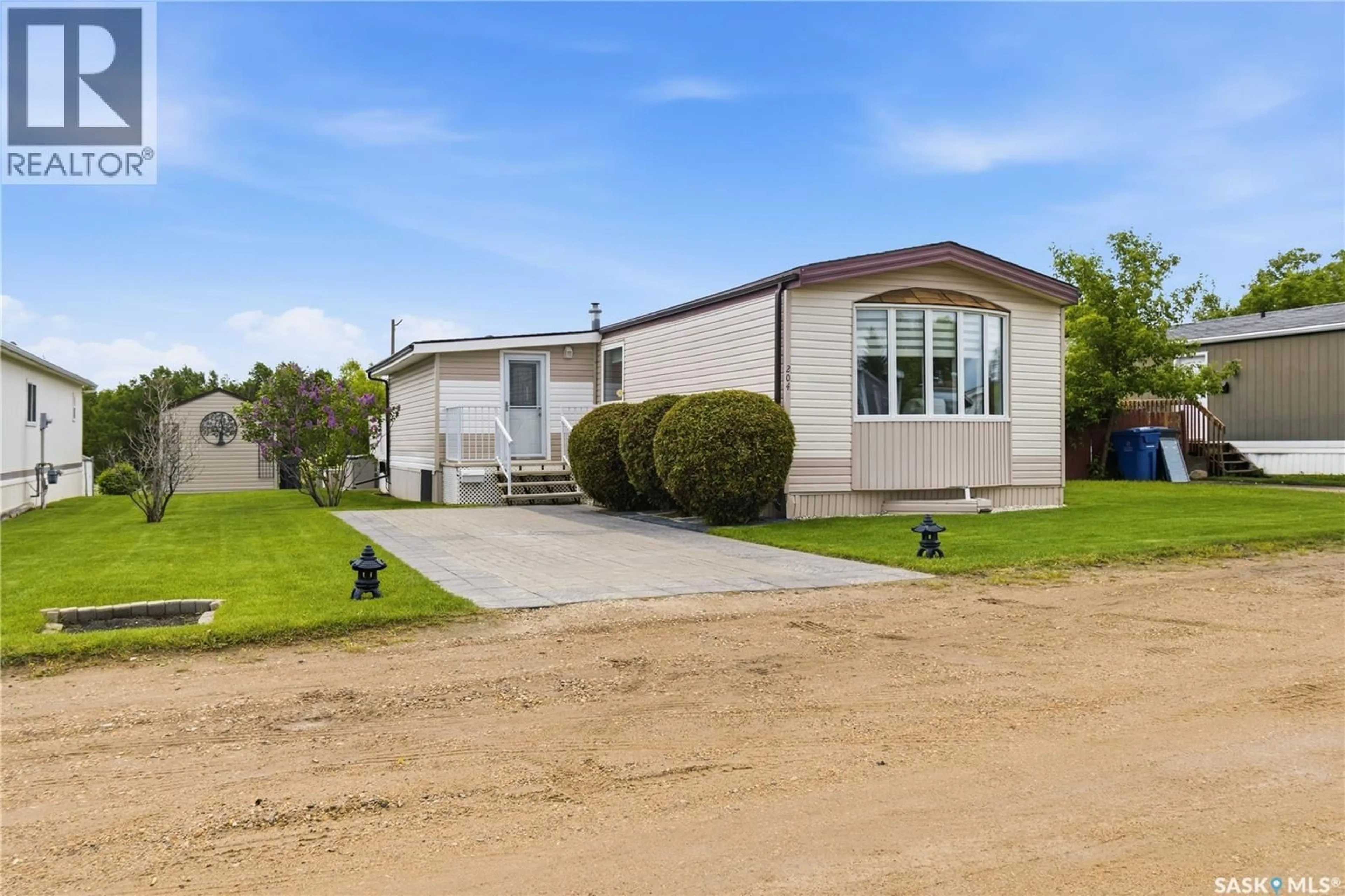 Home with vinyl exterior material, street for 204 CYPRESS WAY, Blucher Rm No. 343 Saskatchewan S7B0A4