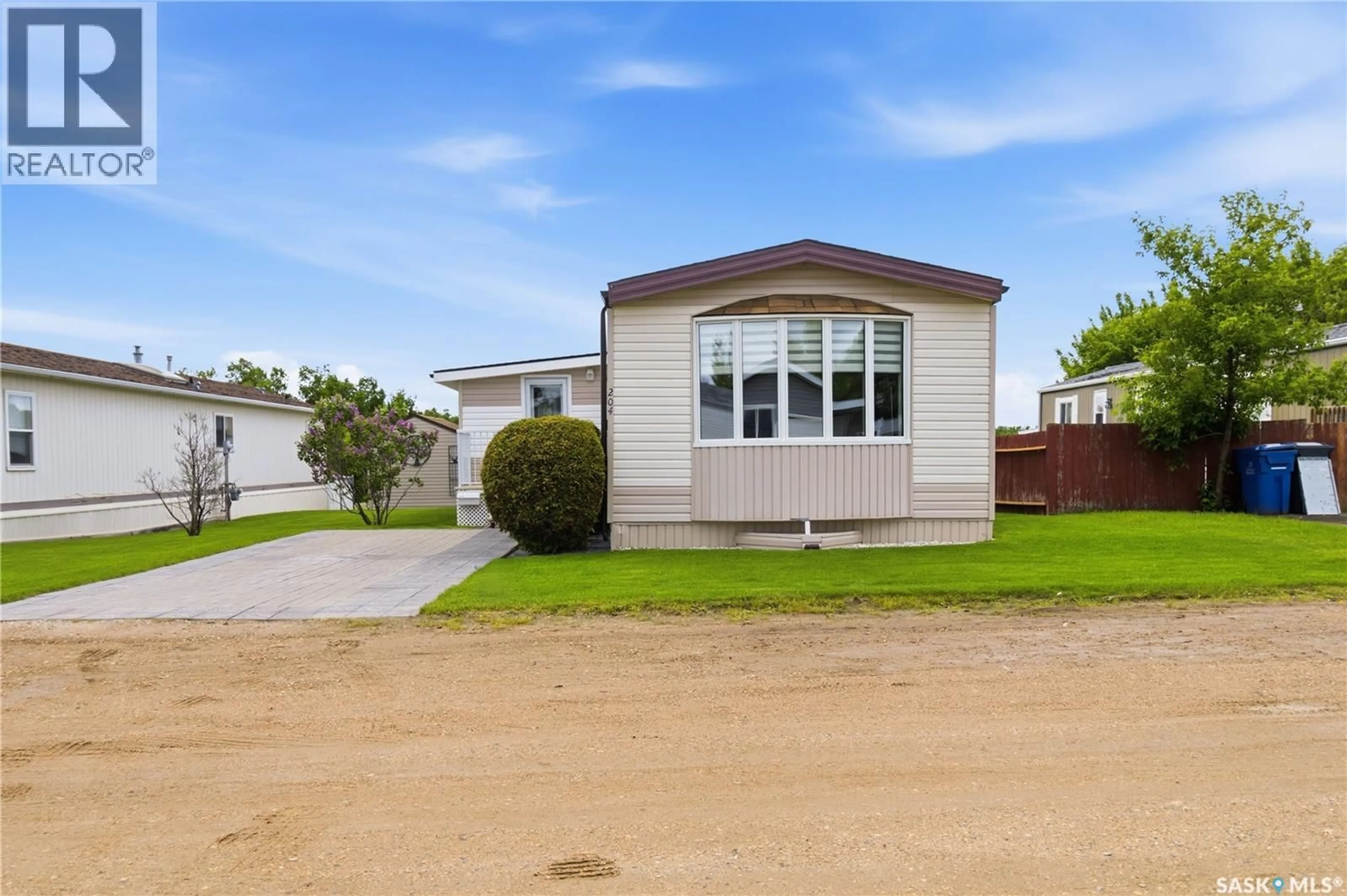 Home with vinyl exterior material, street for 204 CYPRESS WAY, Blucher Rm No. 343 Saskatchewan S7B0A4