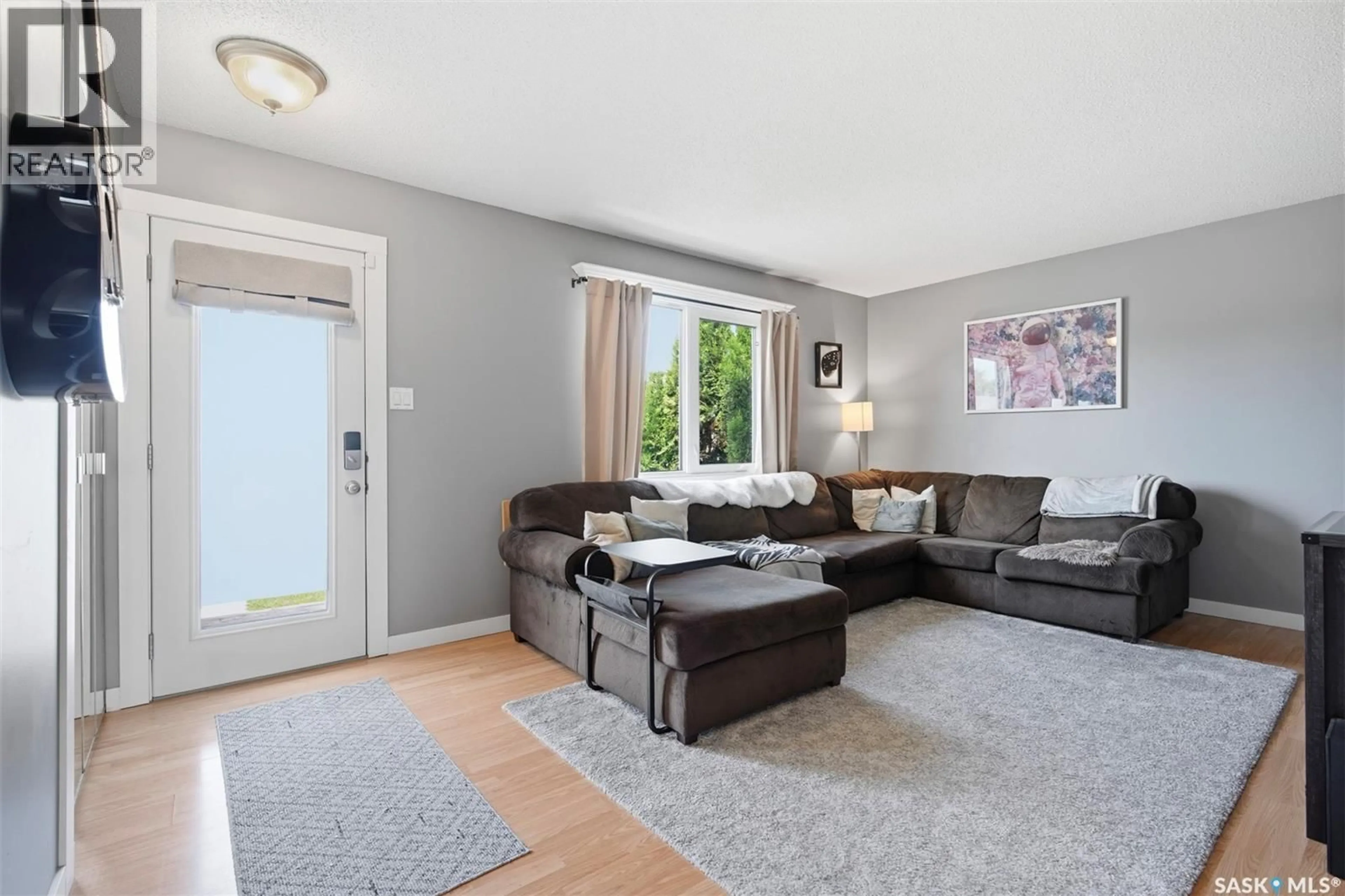 Living room with furniture, unknown for 23 NICHOLSON PLACE, Saskatoon Saskatchewan S7L5G7