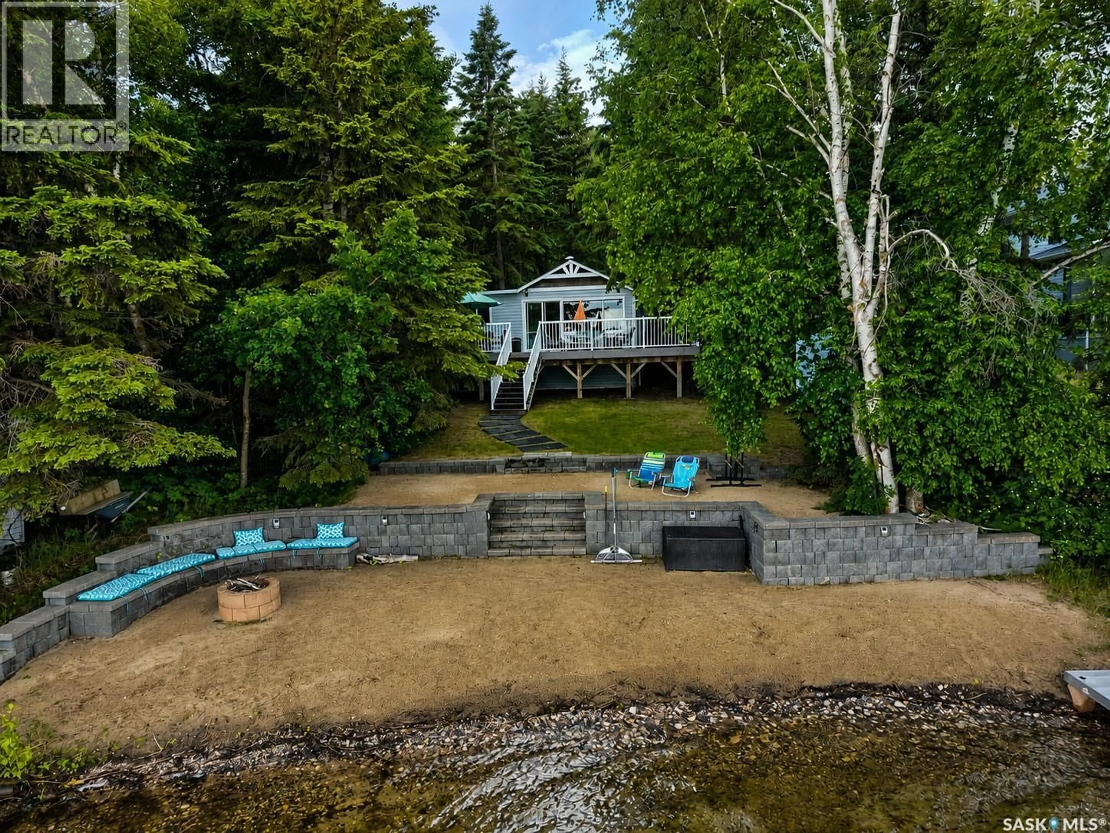 A pic from outside/outdoor area/front of a property/back of a property/a pic from drone, water/lake/river/ocean view for 139 CARWIN PARK DRIVE, Emma Lake Saskatchewan S0J0N0