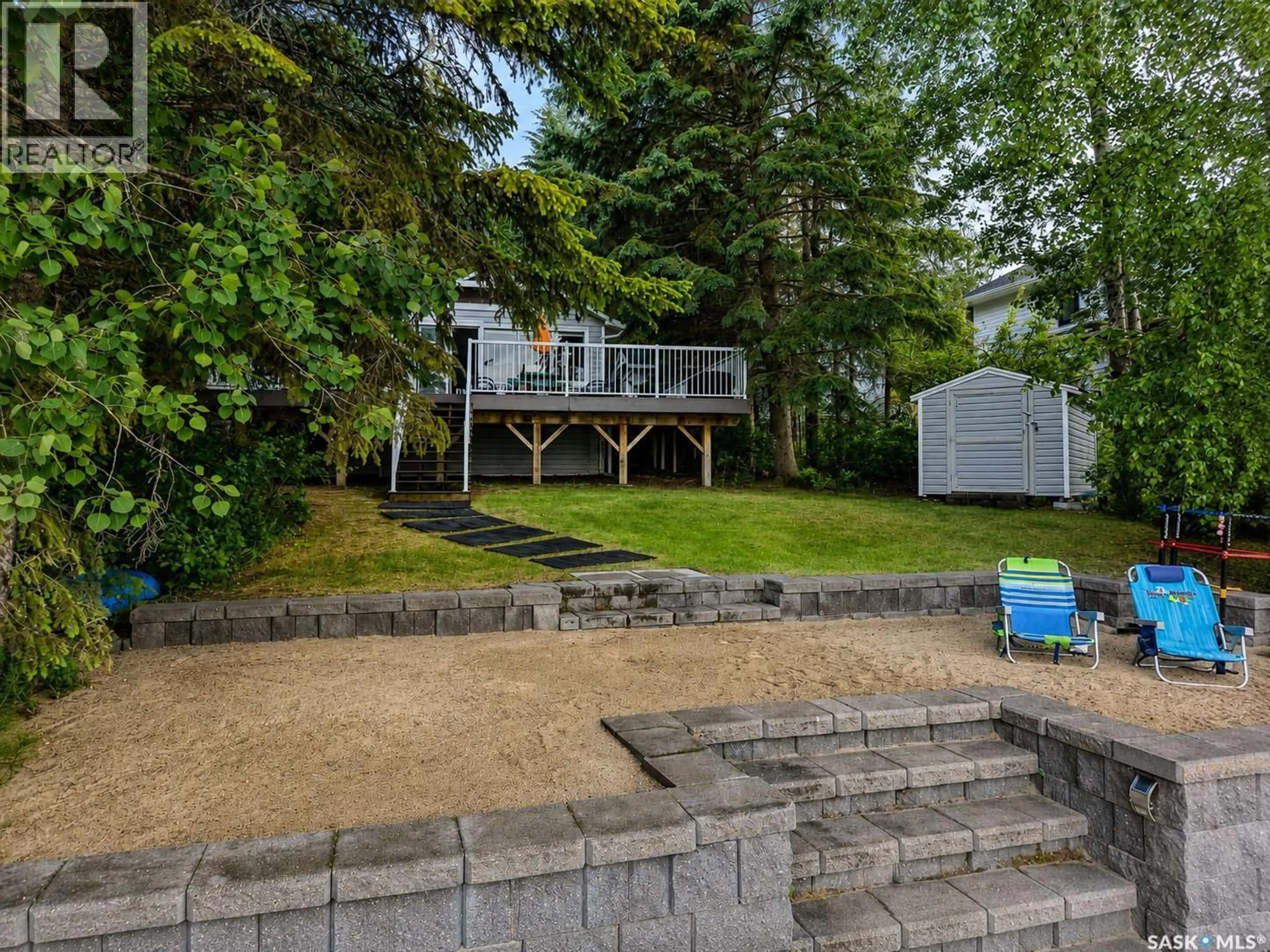 A pic from outside/outdoor area/front of a property/back of a property/a pic from drone, water/lake/river/ocean view for 139 CARWIN PARK DRIVE, Emma Lake Saskatchewan S0J0N0