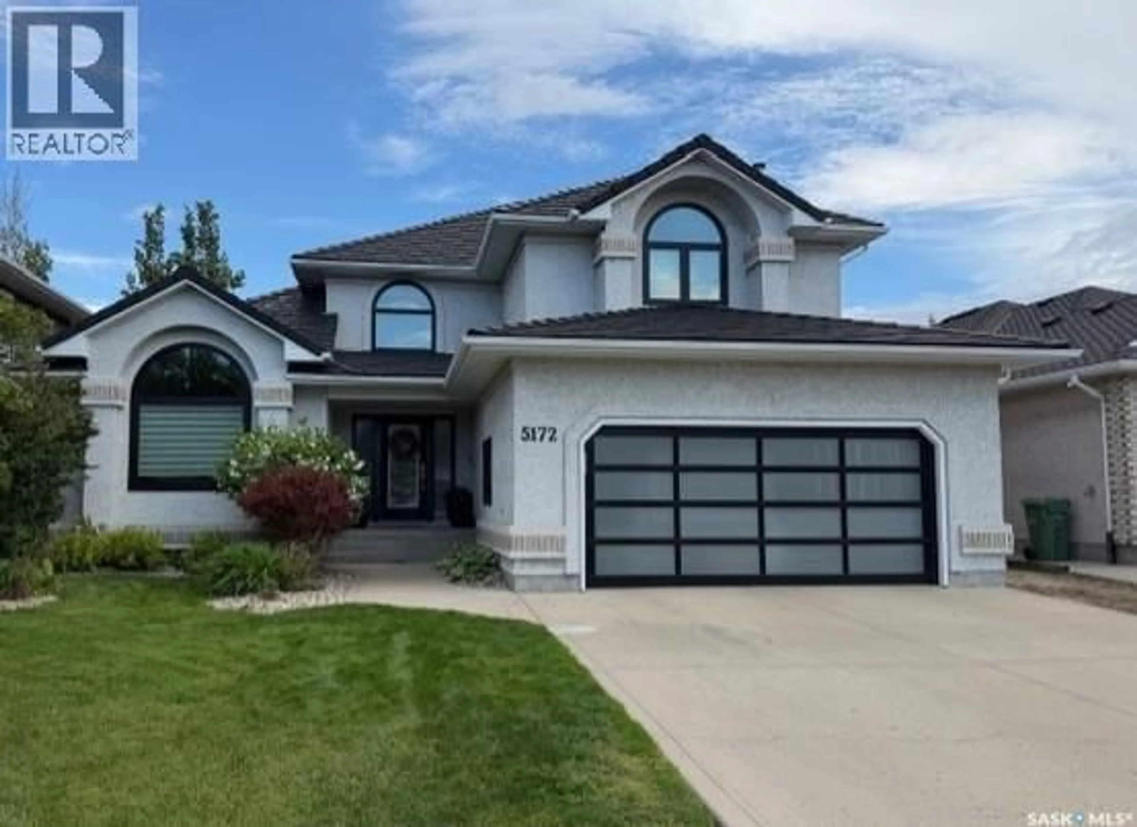 Home with vinyl exterior material, street for 5172 WASCANA VISTA PLACE, Regina Saskatchewan S4V2S3