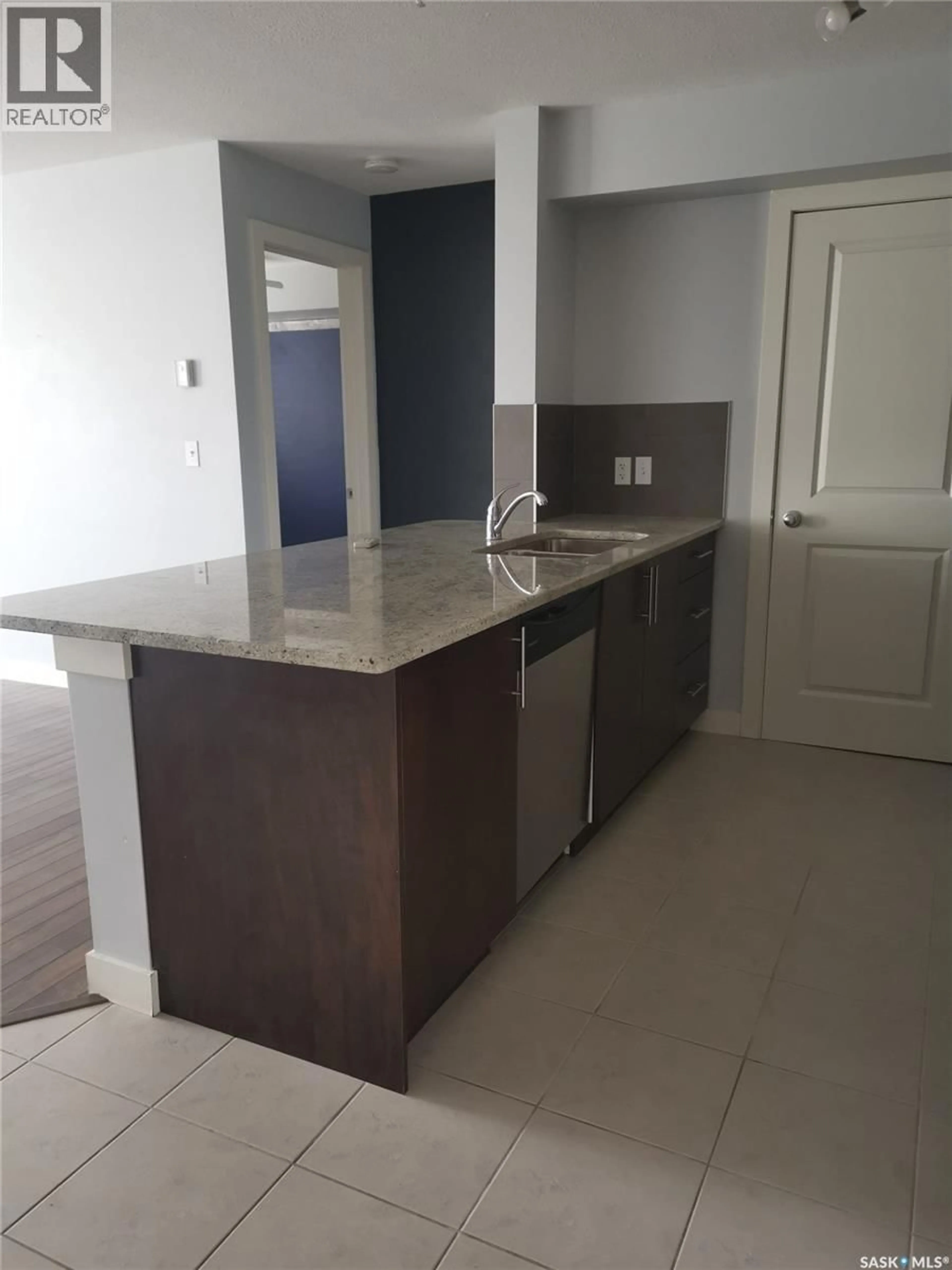 Open concept kitchen, ceramic/tile floor for 104 - 306 PETTERSON DRIVE, Estevan Saskatchewan S4A2A8