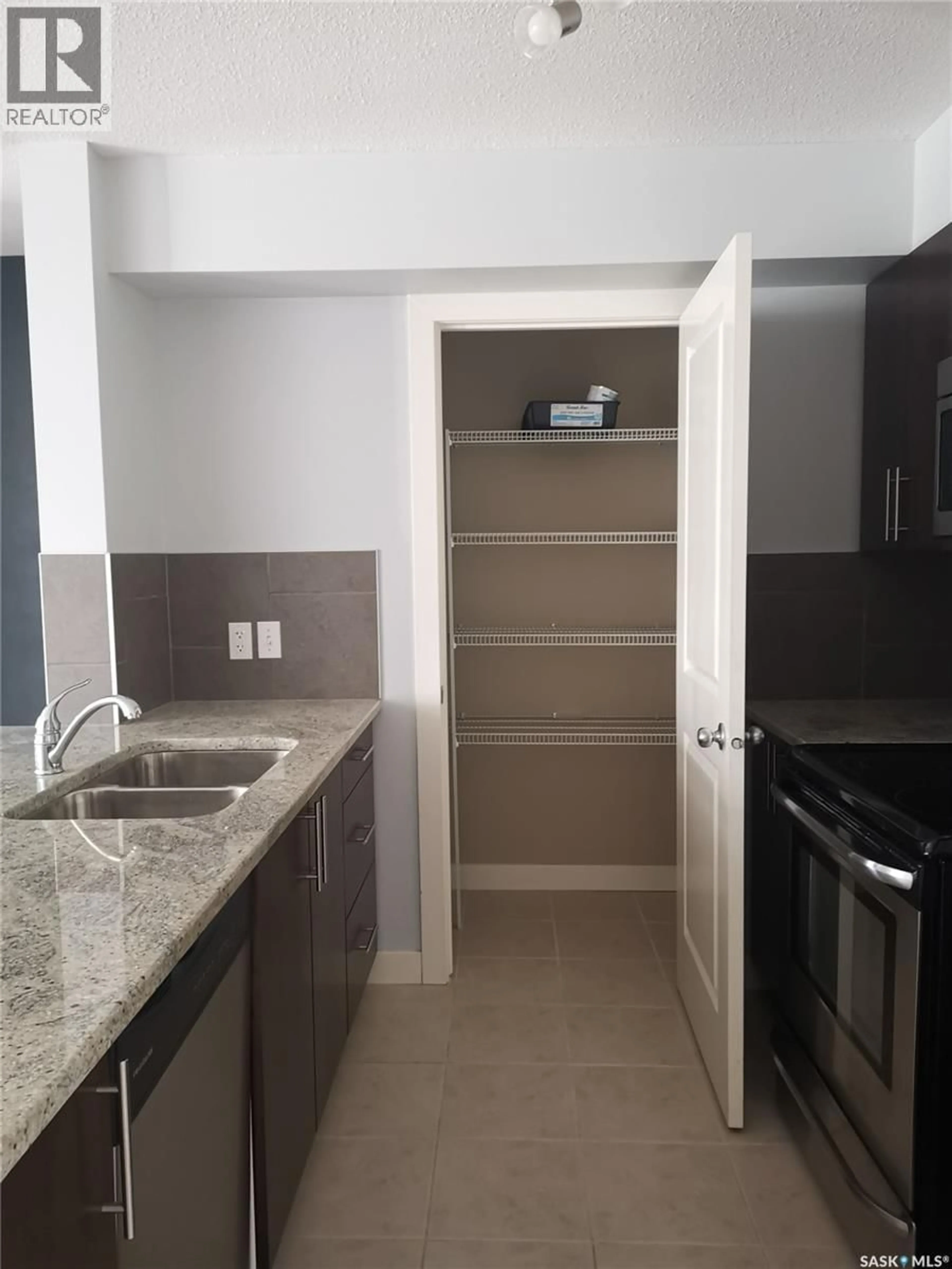 Standard kitchen, ceramic/tile floor for 104 - 306 PETTERSON DRIVE, Estevan Saskatchewan S4A2A8
