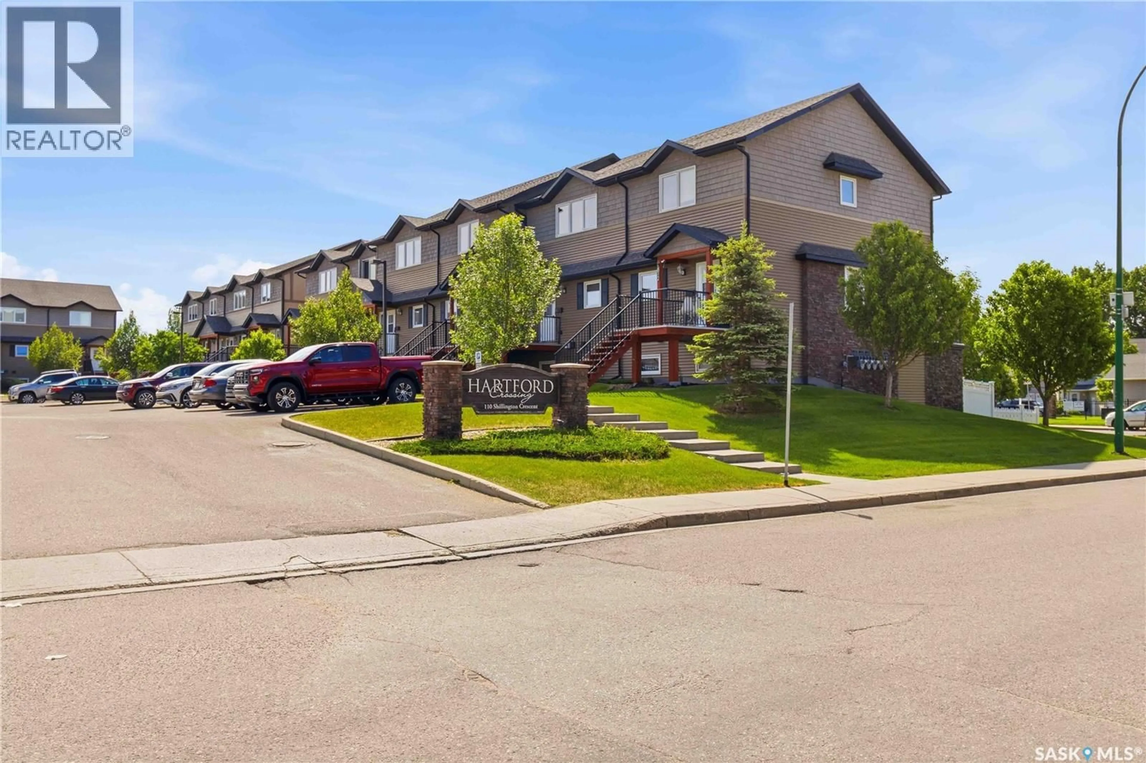 A pic from outside/outdoor area/front of a property/back of a property/a pic from drone, street for 110 - 807 SHILLINGTON CRESCENT, Saskatoon Saskatchewan S7M3Z8