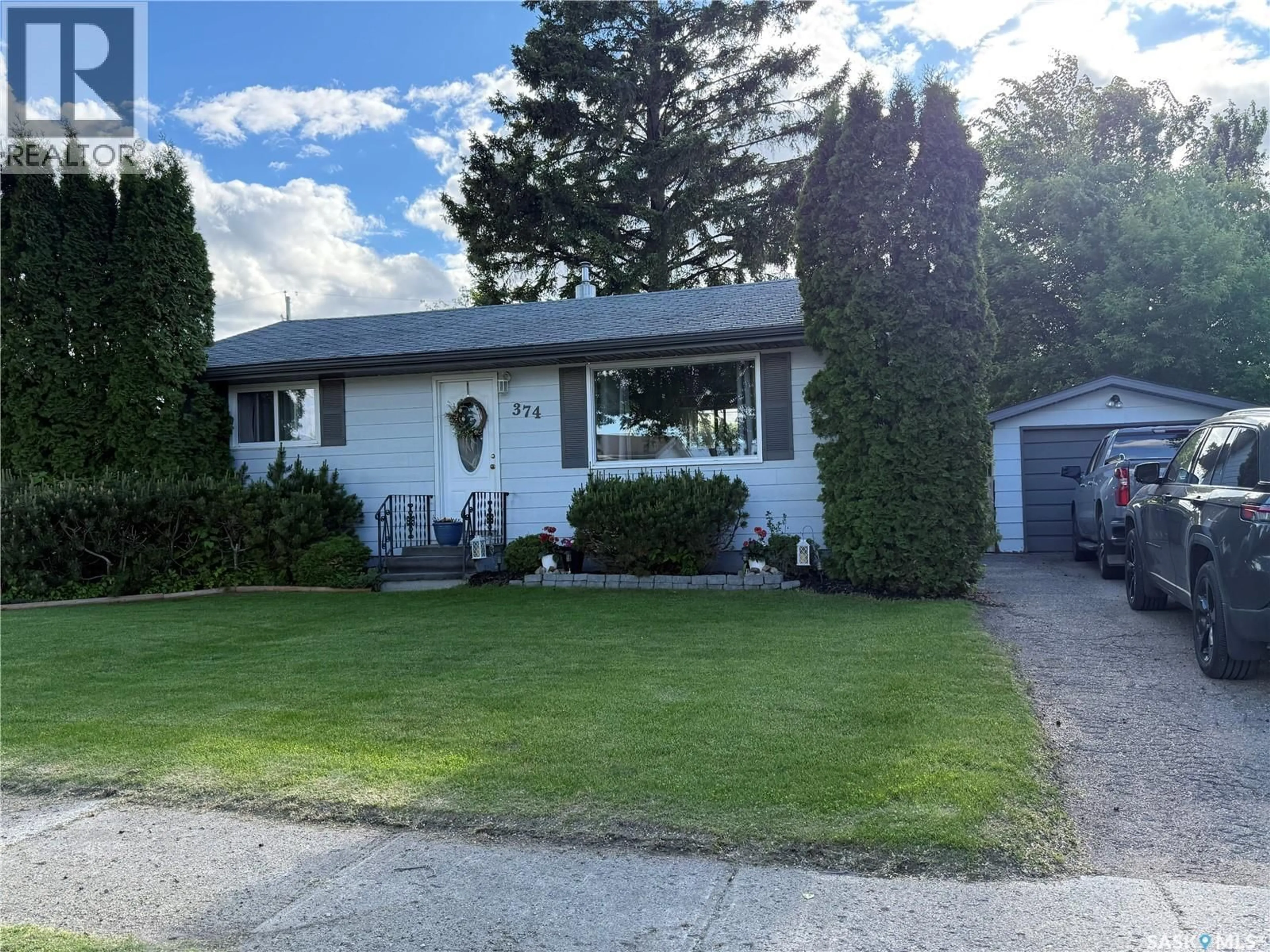 Home with vinyl exterior material, street for 374 FOURTH AVENUE, Yorkton Saskatchewan S3N1B6