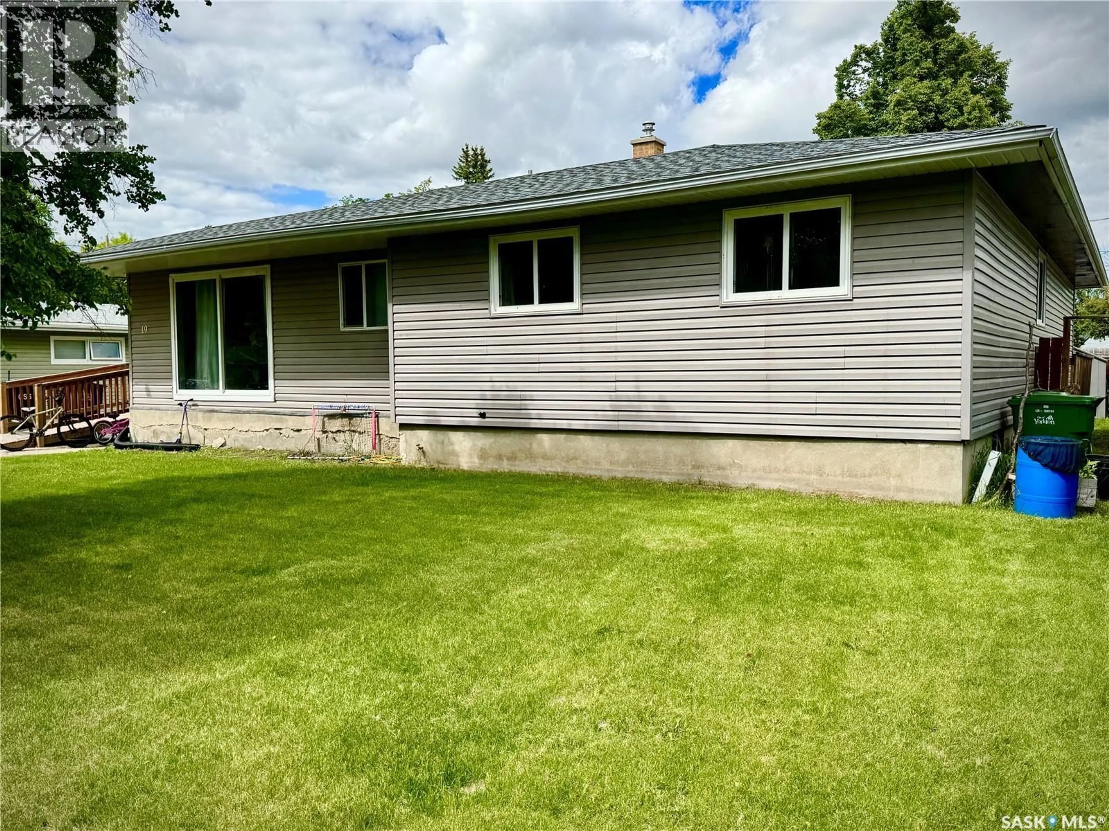 A pic from outside/outdoor area/front of a property/back of a property/a pic from drone, unknown for 19 LOGAN CRESCENT, Yorkton Saskatchewan S3N0W1