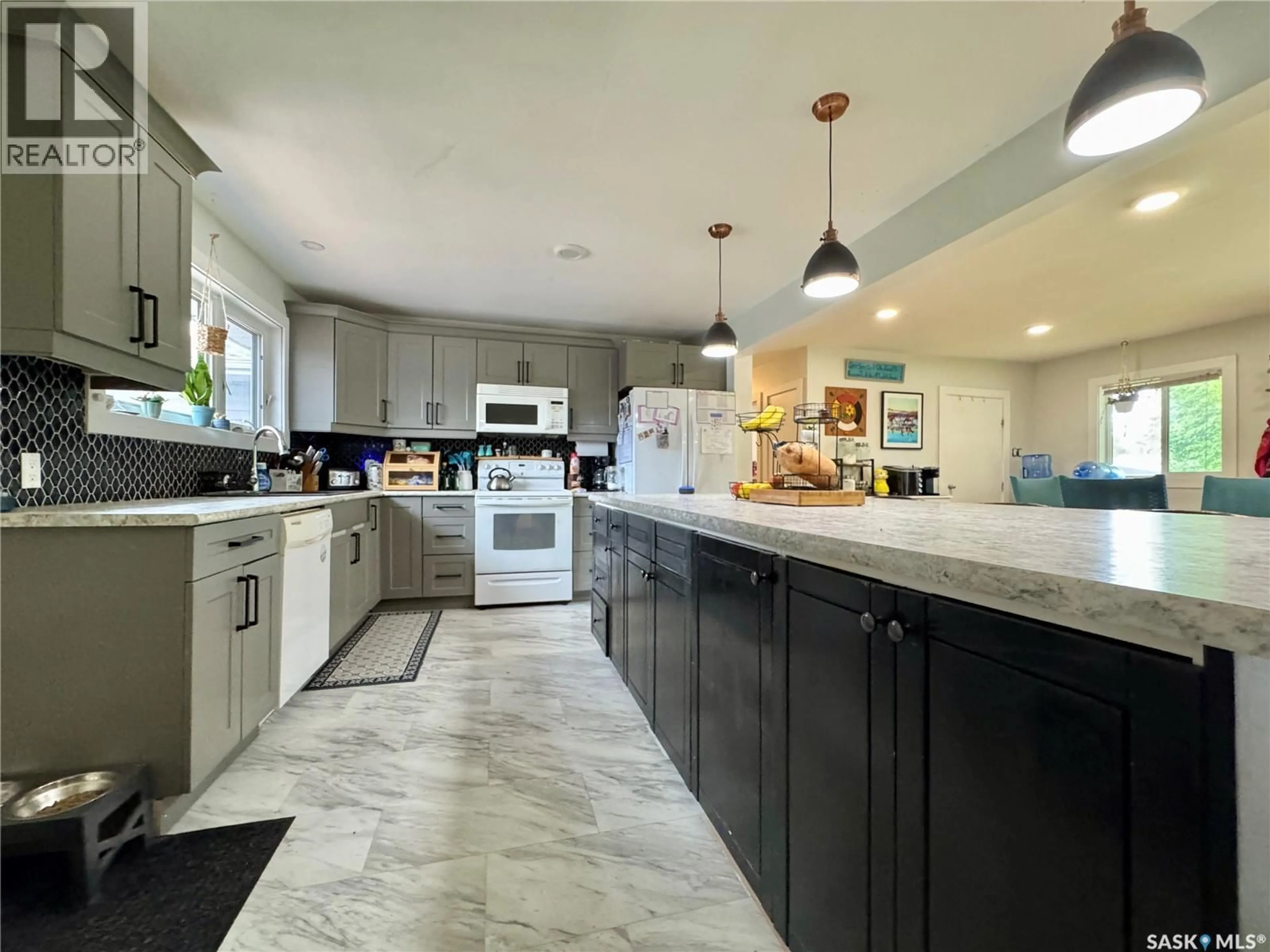 Open concept kitchen, ceramic/tile floor for 19 LOGAN CRESCENT, Yorkton Saskatchewan S3N0W1
