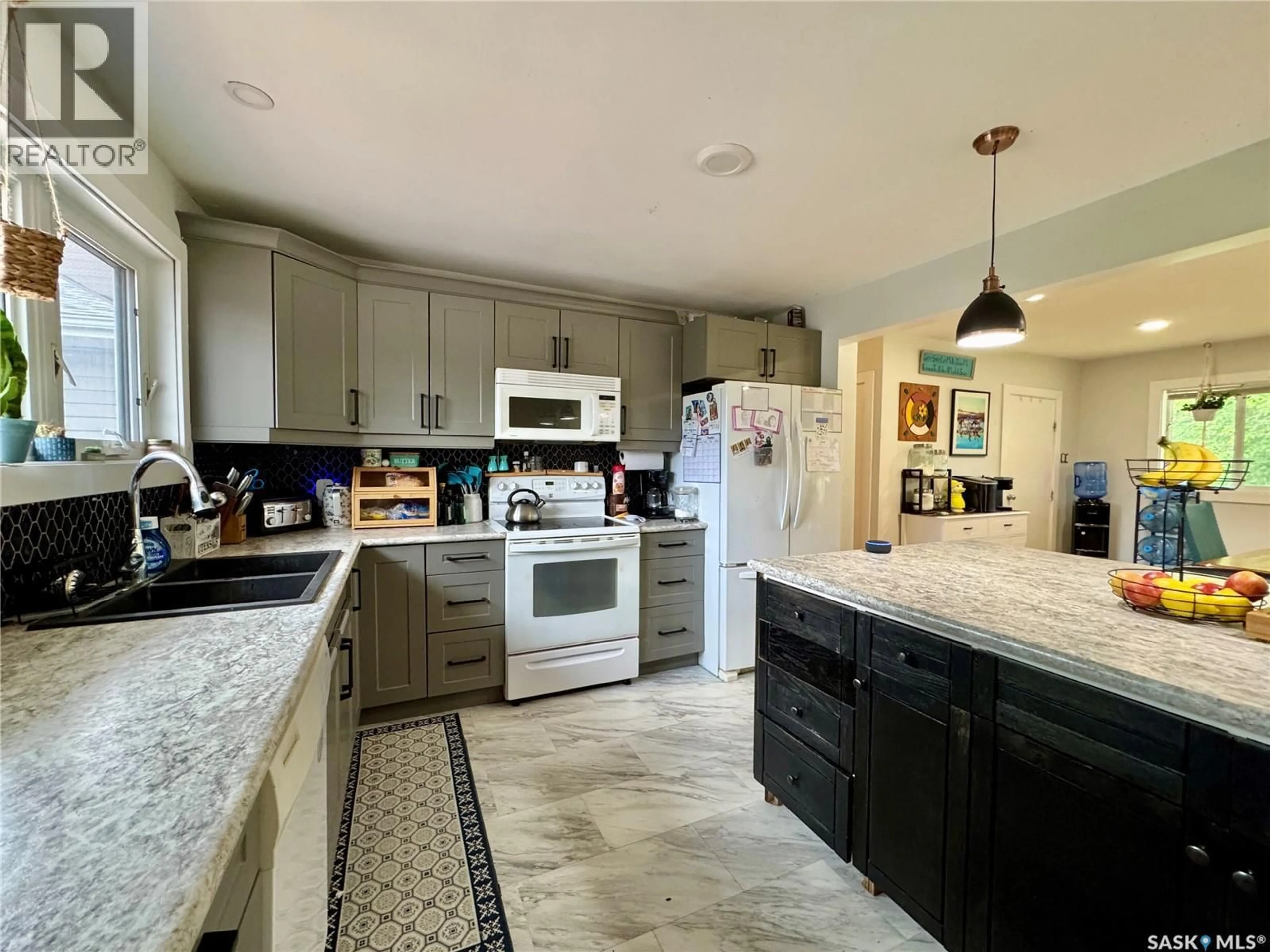 Open concept kitchen, ceramic/tile floor for 19 LOGAN CRESCENT, Yorkton Saskatchewan S3N0W1