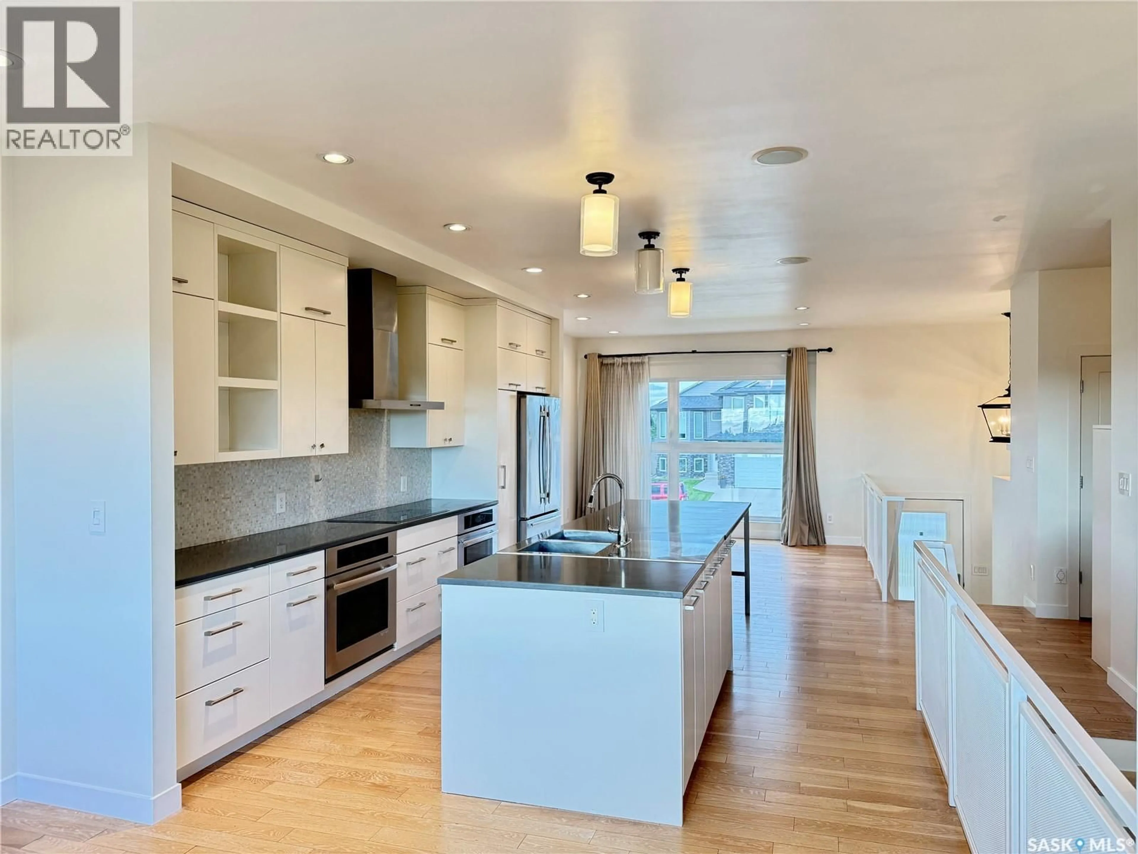 Open concept kitchen, unknown for 926 WILKINS COURT, Saskatoon Saskatchewan S7W0C7