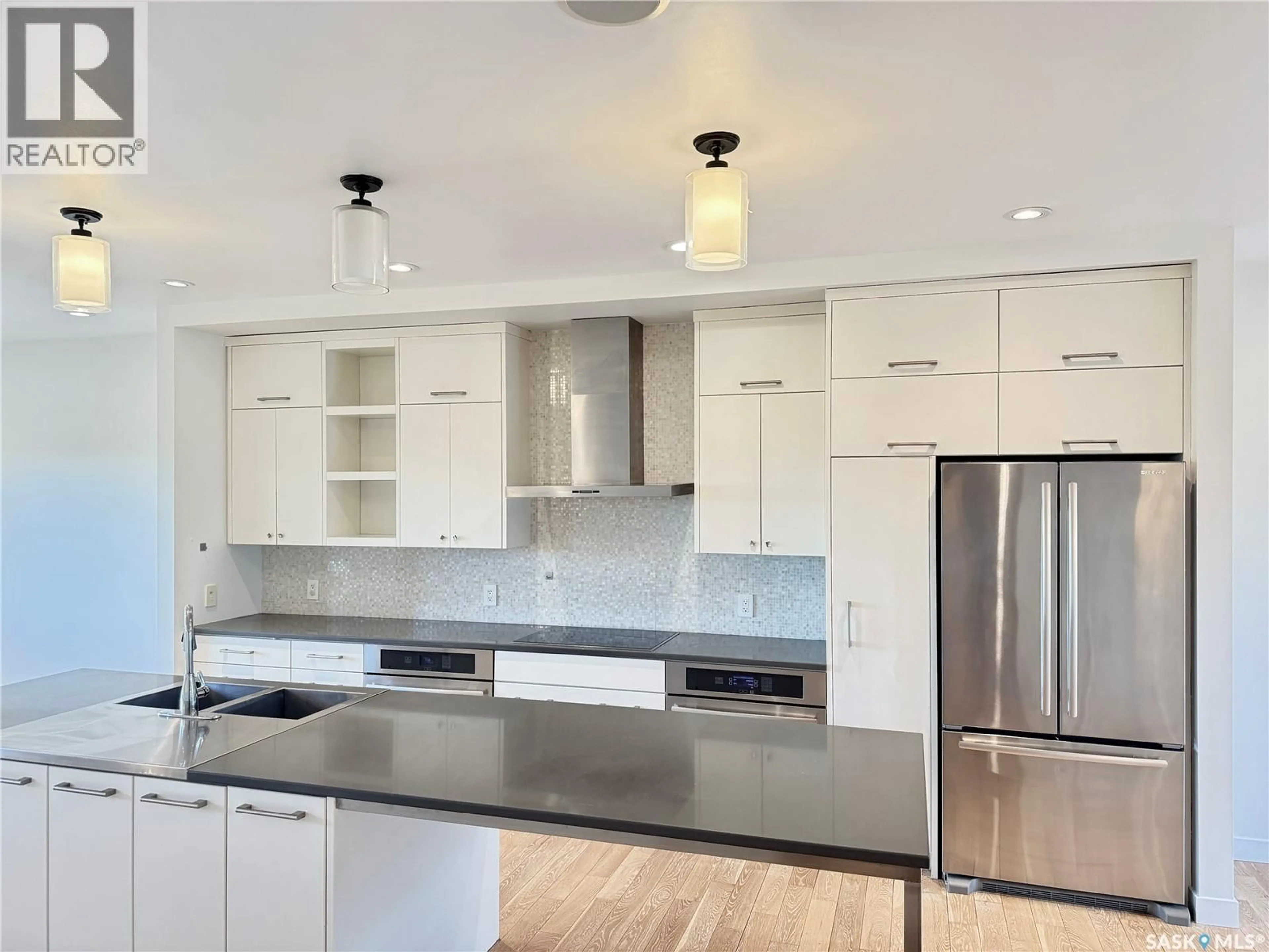Open concept kitchen, unknown for 926 WILKINS COURT, Saskatoon Saskatchewan S7W0C7