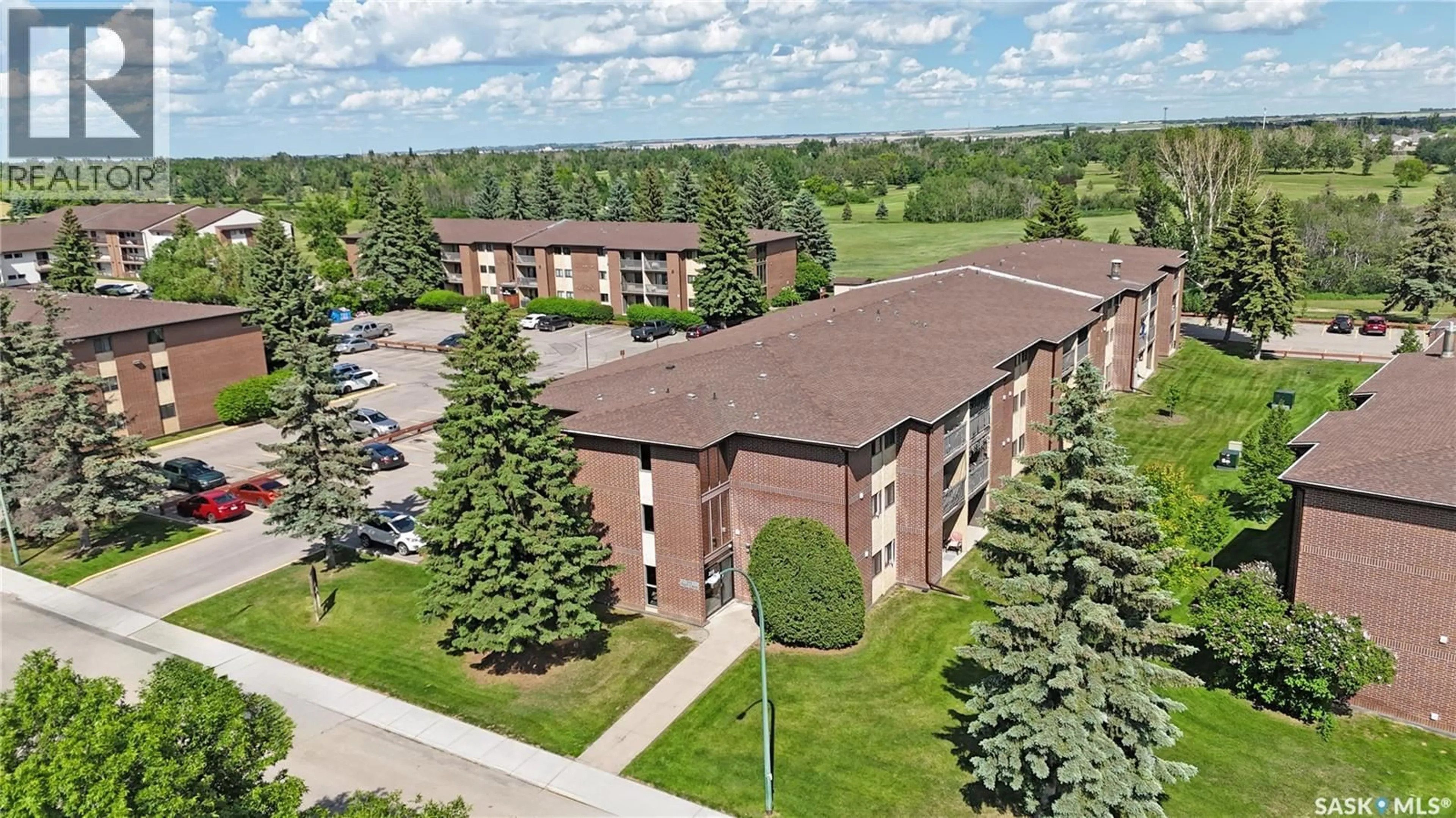 A pic from outside/outdoor area/front of a property/back of a property/a pic from drone, building for 309 315 TAIT CRESCENT, Saskatoon Saskatchewan S7H5L6