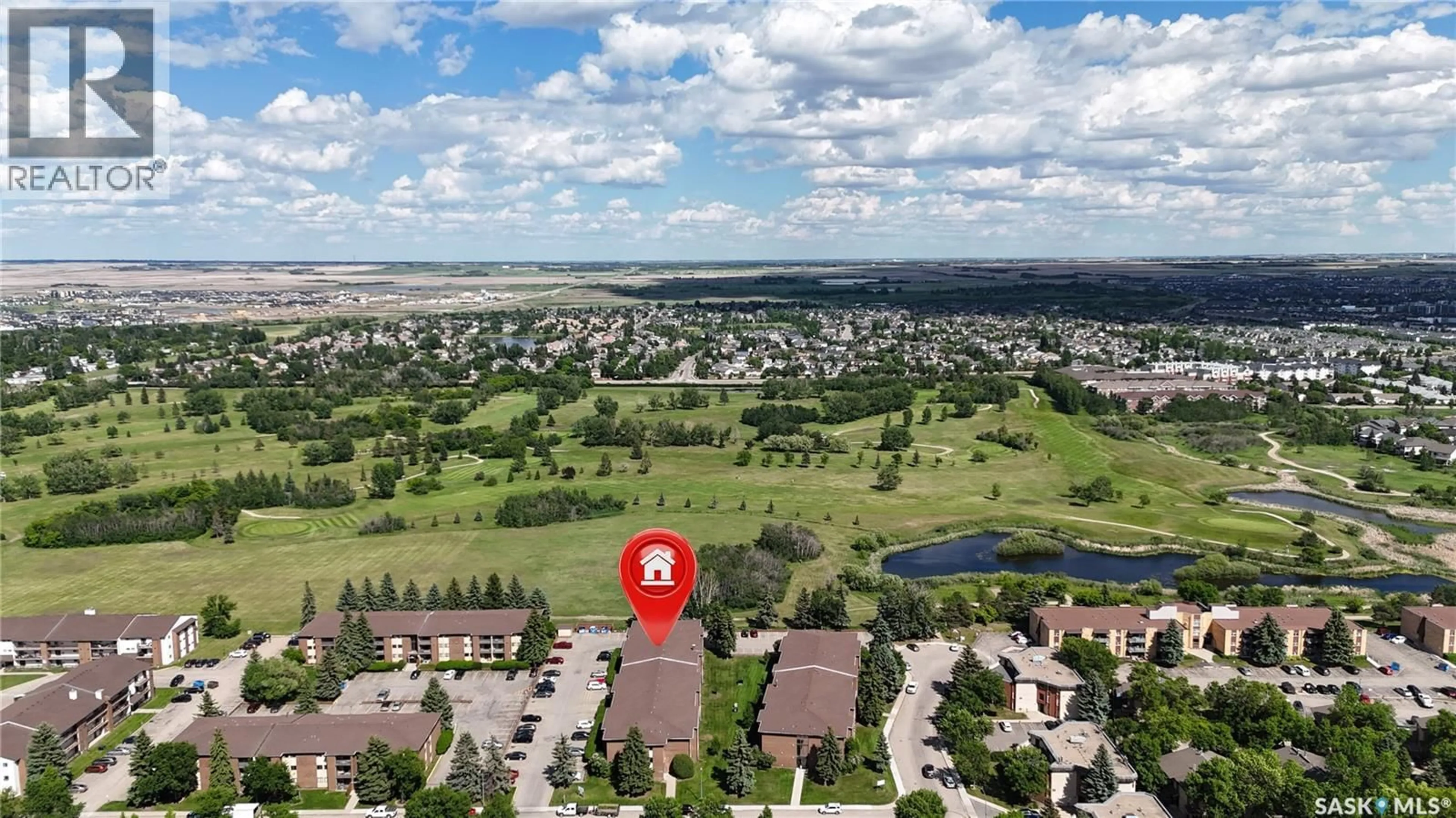 A pic from outside/outdoor area/front of a property/back of a property/a pic from drone, water/lake/river/ocean view for 309 315 TAIT CRESCENT, Saskatoon Saskatchewan S7H5L6