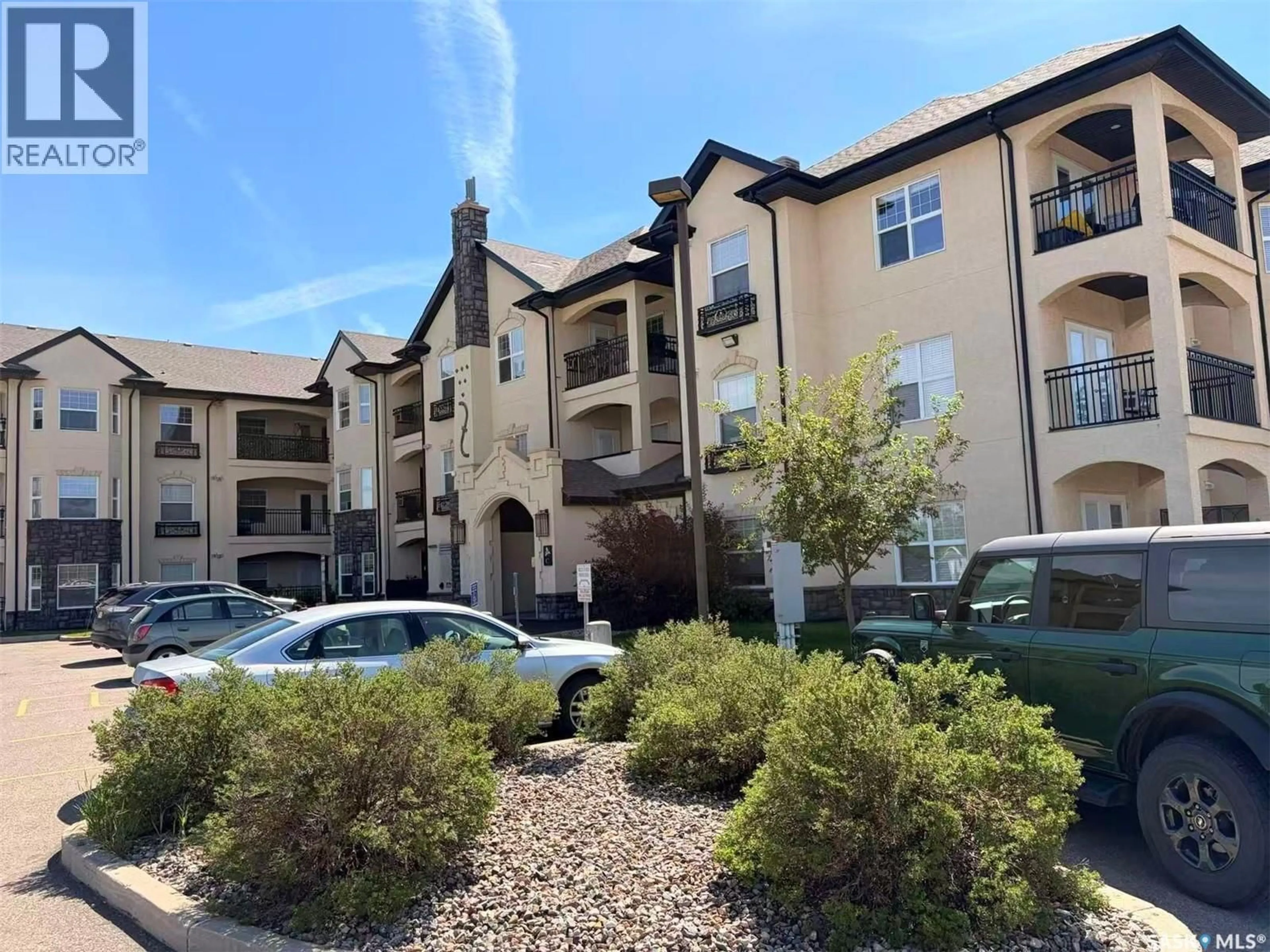 A pic from outside/outdoor area/front of a property/back of a property/a pic from drone, unknown for 311C - 415 HUNTER ROAD, Saskatoon Saskatchewan S7T0J9