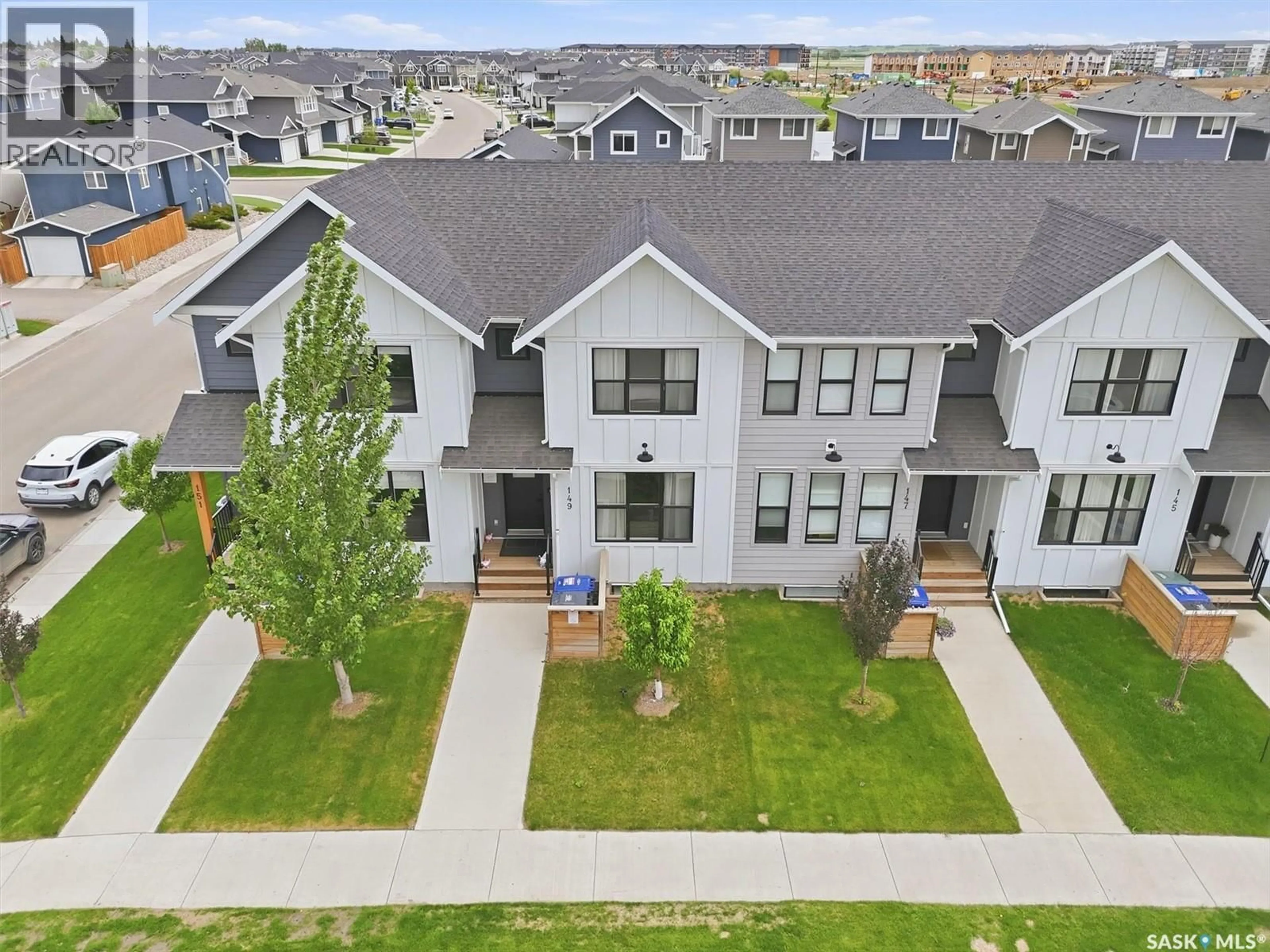 A pic from outside/outdoor area/front of a property/back of a property/a pic from drone, unknown for 149 ROSEWOOD BOULEVARD, Saskatoon Saskatchewan S7V0Z1