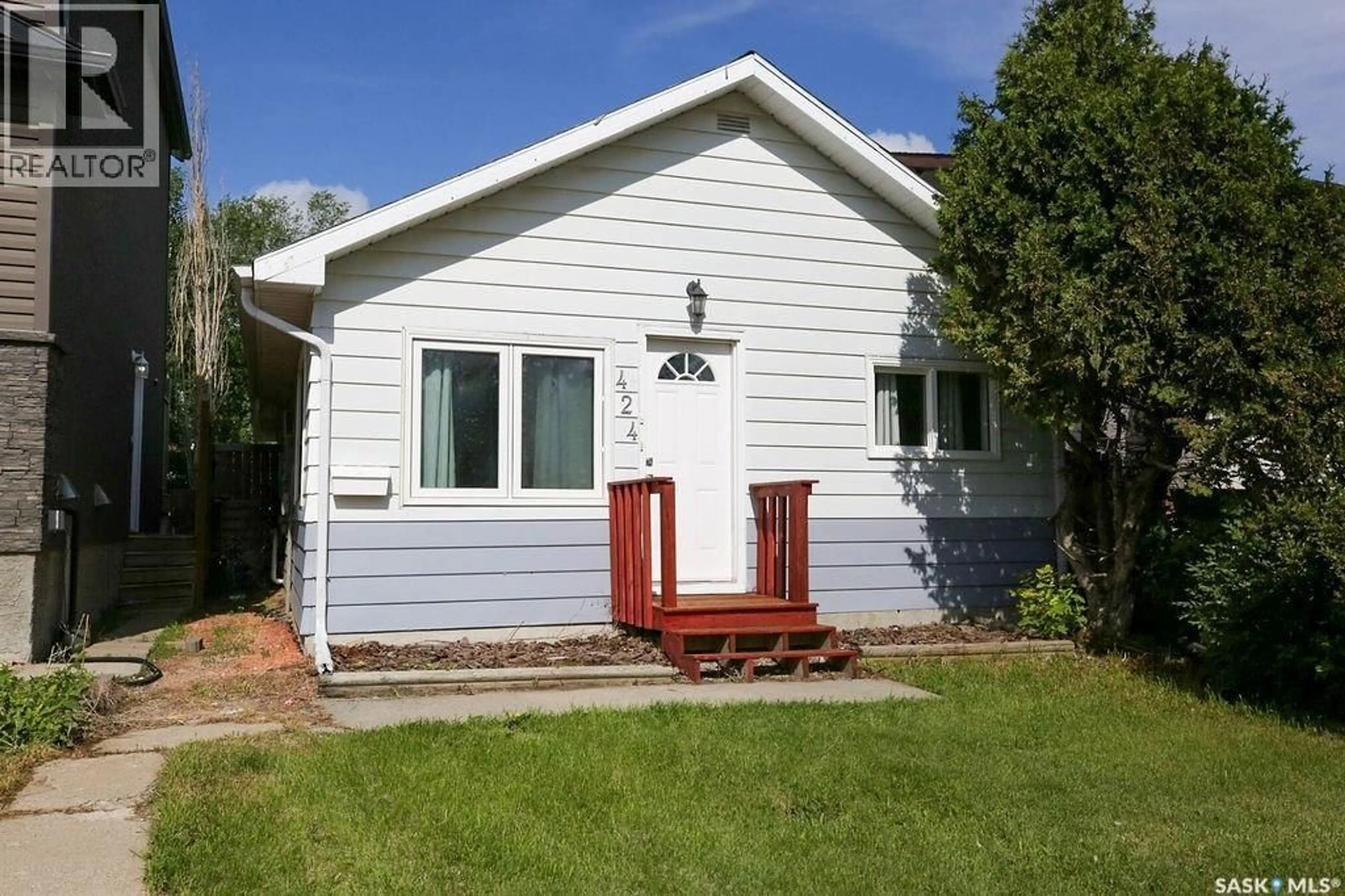Home with vinyl exterior material, street for 424 ARTHUR STREET, Regina Saskatchewan S4R4X4