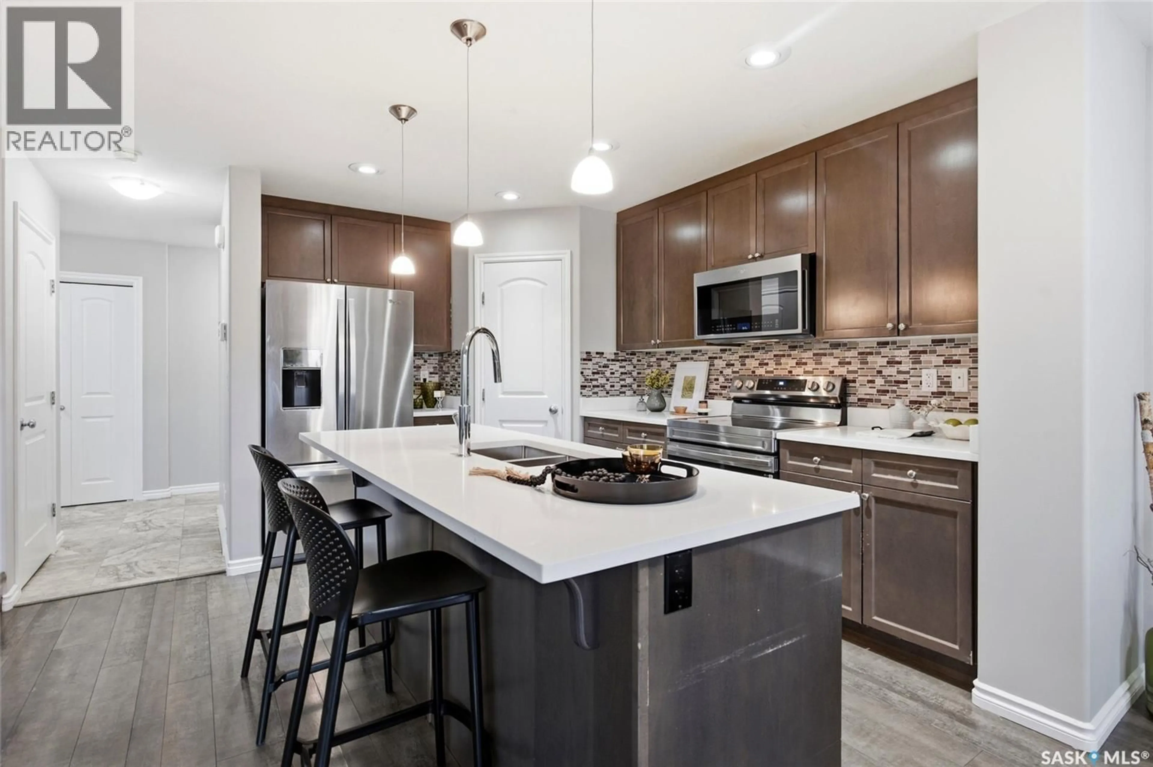 Open concept kitchen, ceramic/tile floor for 334 DICKSON CRESCENT, Saskatoon Saskatchewan S7T0T8