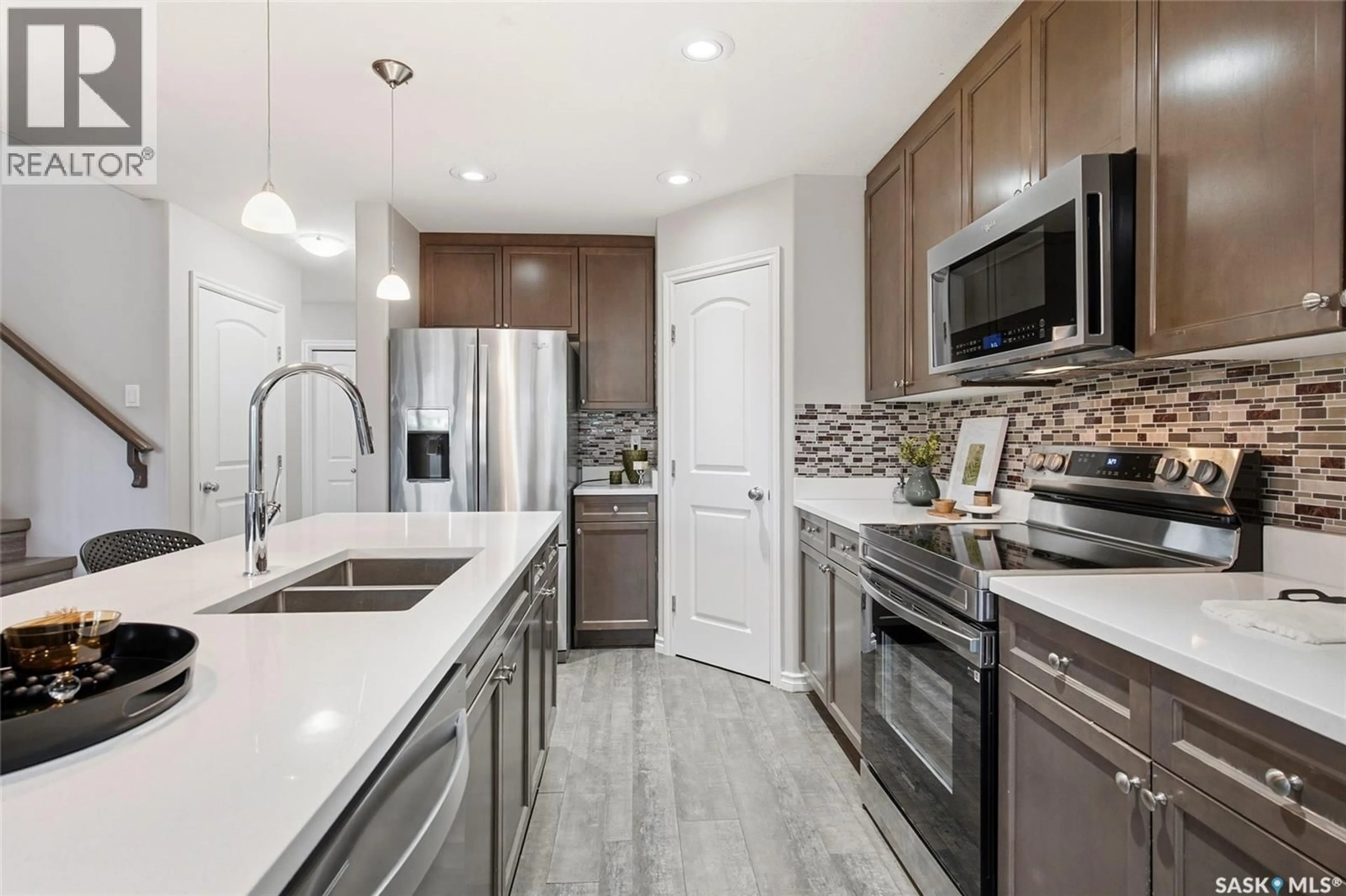 Open concept kitchen, ceramic/tile floor for 334 DICKSON CRESCENT, Saskatoon Saskatchewan S7T0T8