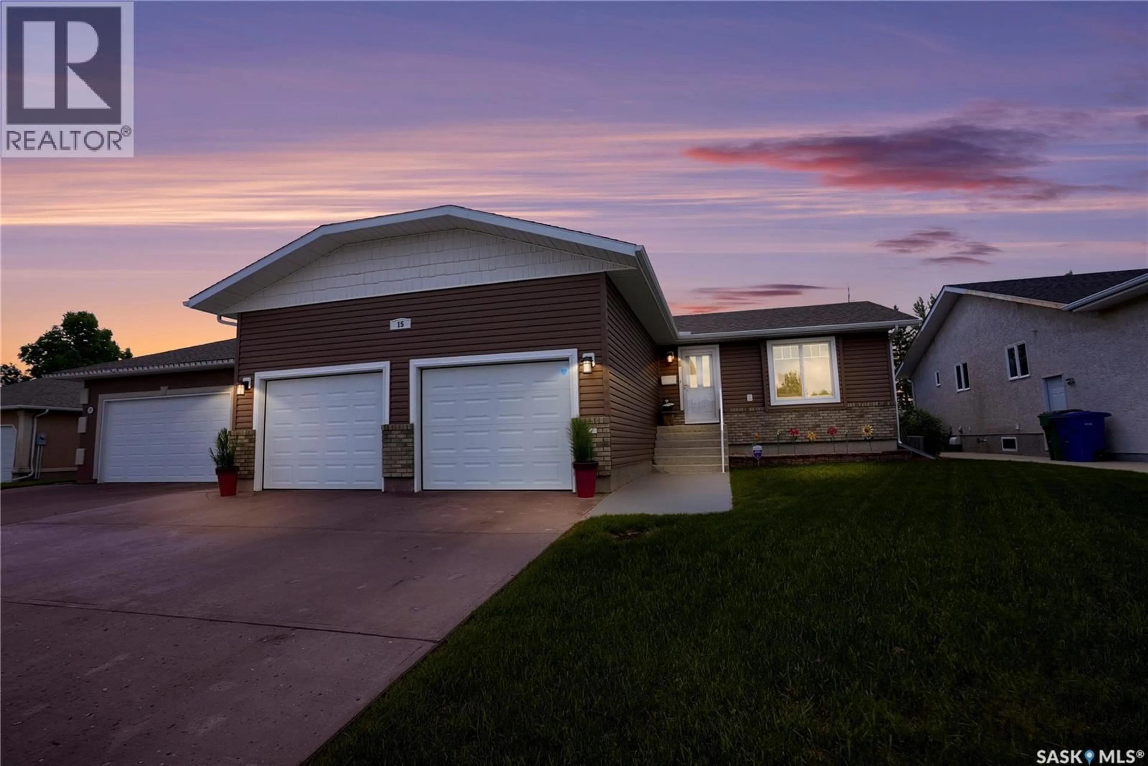 Home with vinyl exterior material, street for 15 MARIGOLD CRESCENT, Moose Jaw Saskatchewan S6J1L2