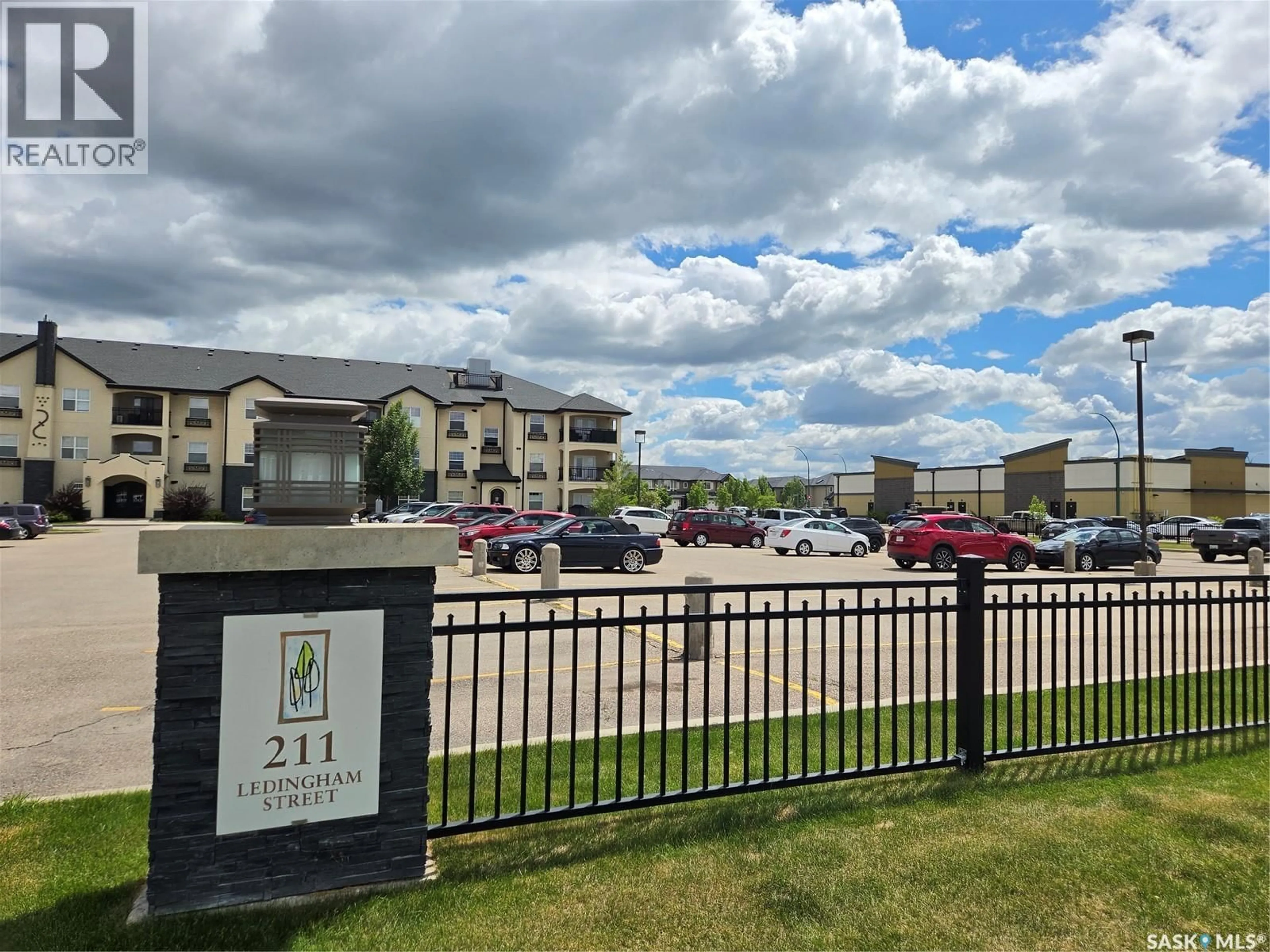 A pic from outside/outdoor area/front of a property/back of a property/a pic from drone, street for 211 - 216 LEDINGHAM STREET, Saskatoon Saskatchewan S7V0C5